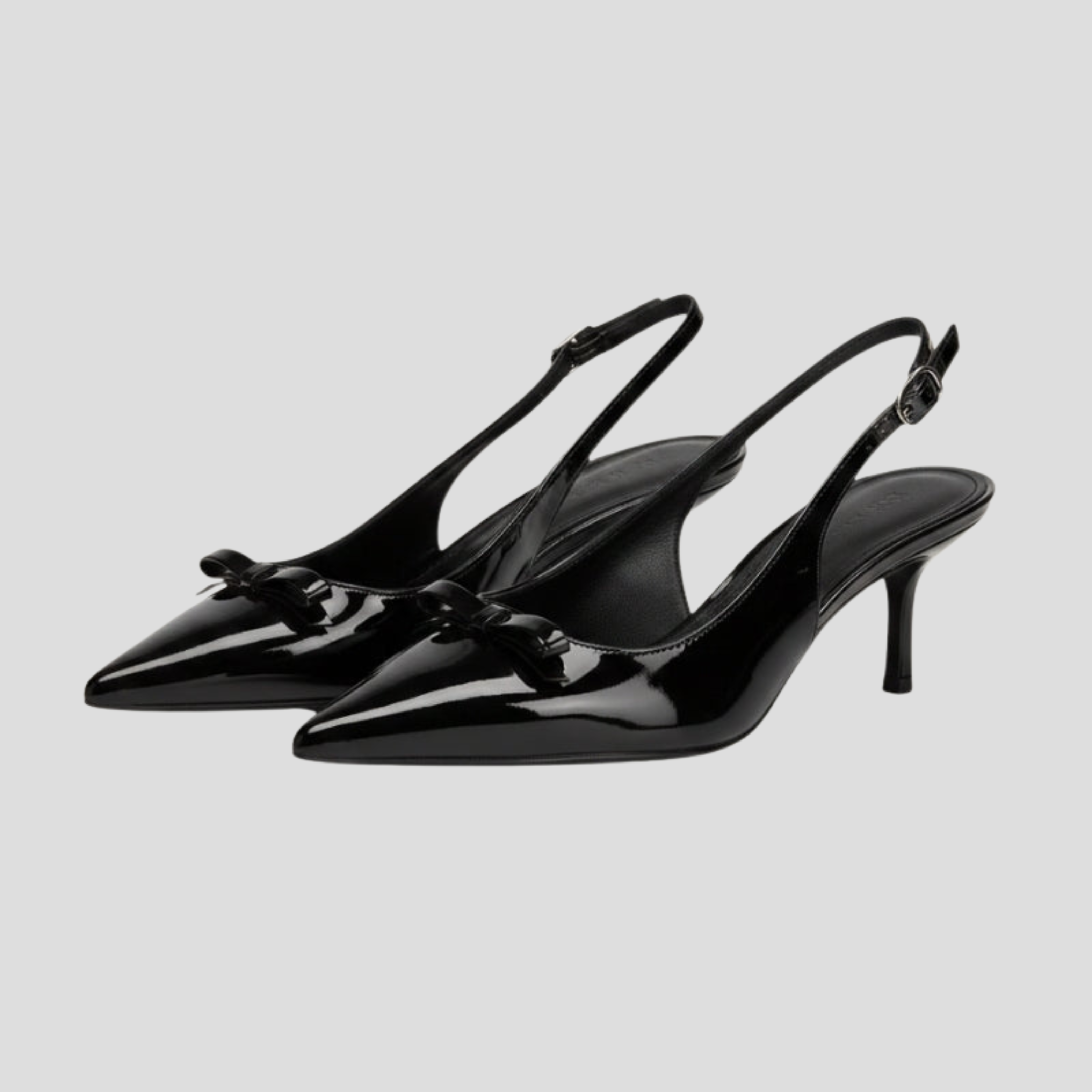 Black pointed toe slingback heel for evening wear