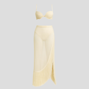 White two-piece set with fitted bralette top and flowing fringe maxi skirt for occasion wear