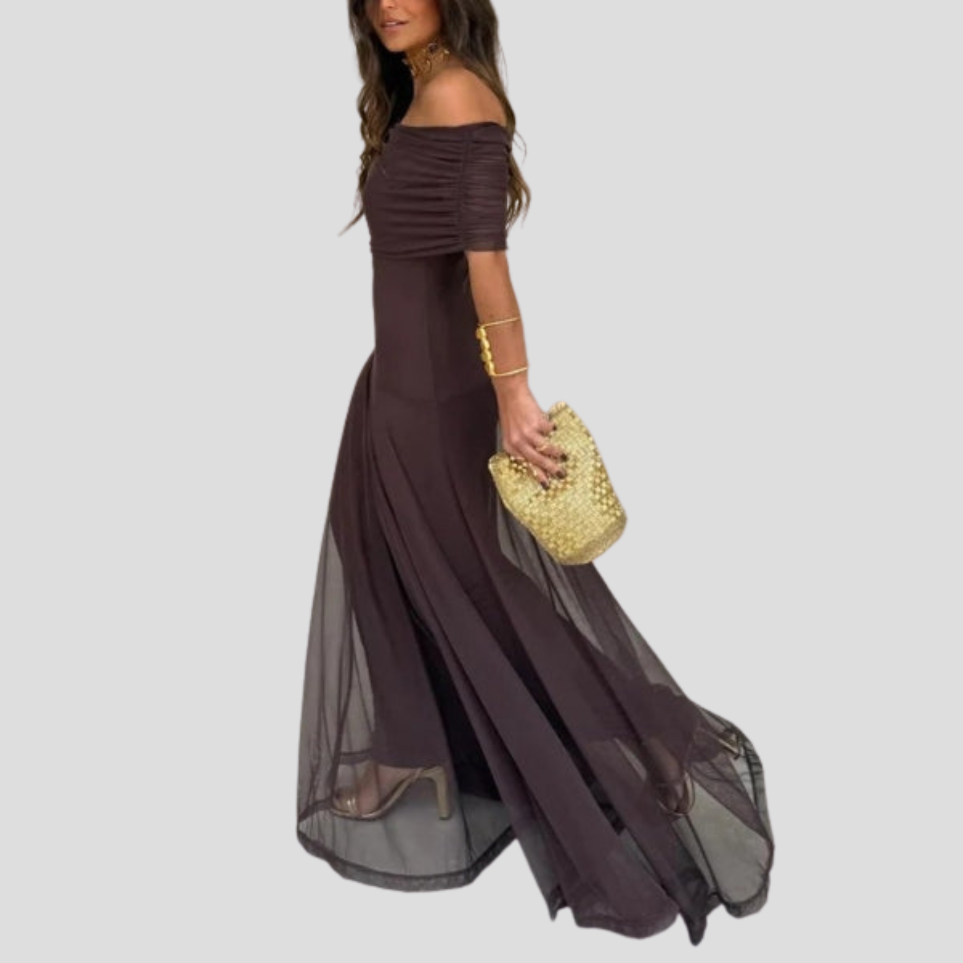 Brown off-shoulder maxi dress with sheer overlay and floor-length silhouette for evening wear