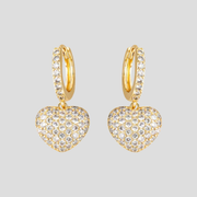 Heart charm pavé drop earrings shown in gold and silver finishes