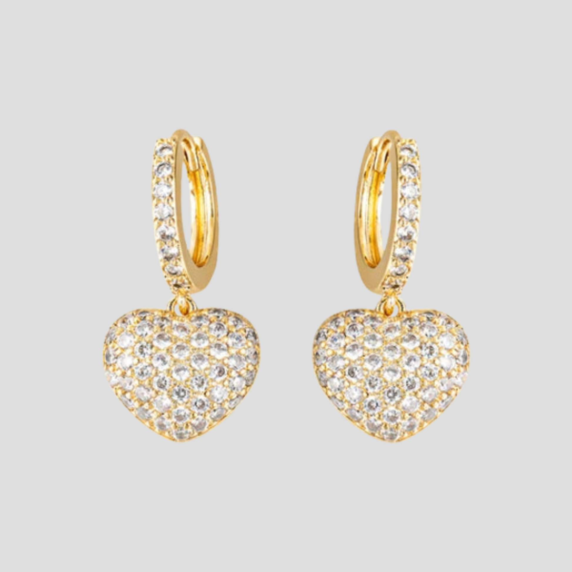 Heart charm pavé drop earrings shown in gold and silver finishes