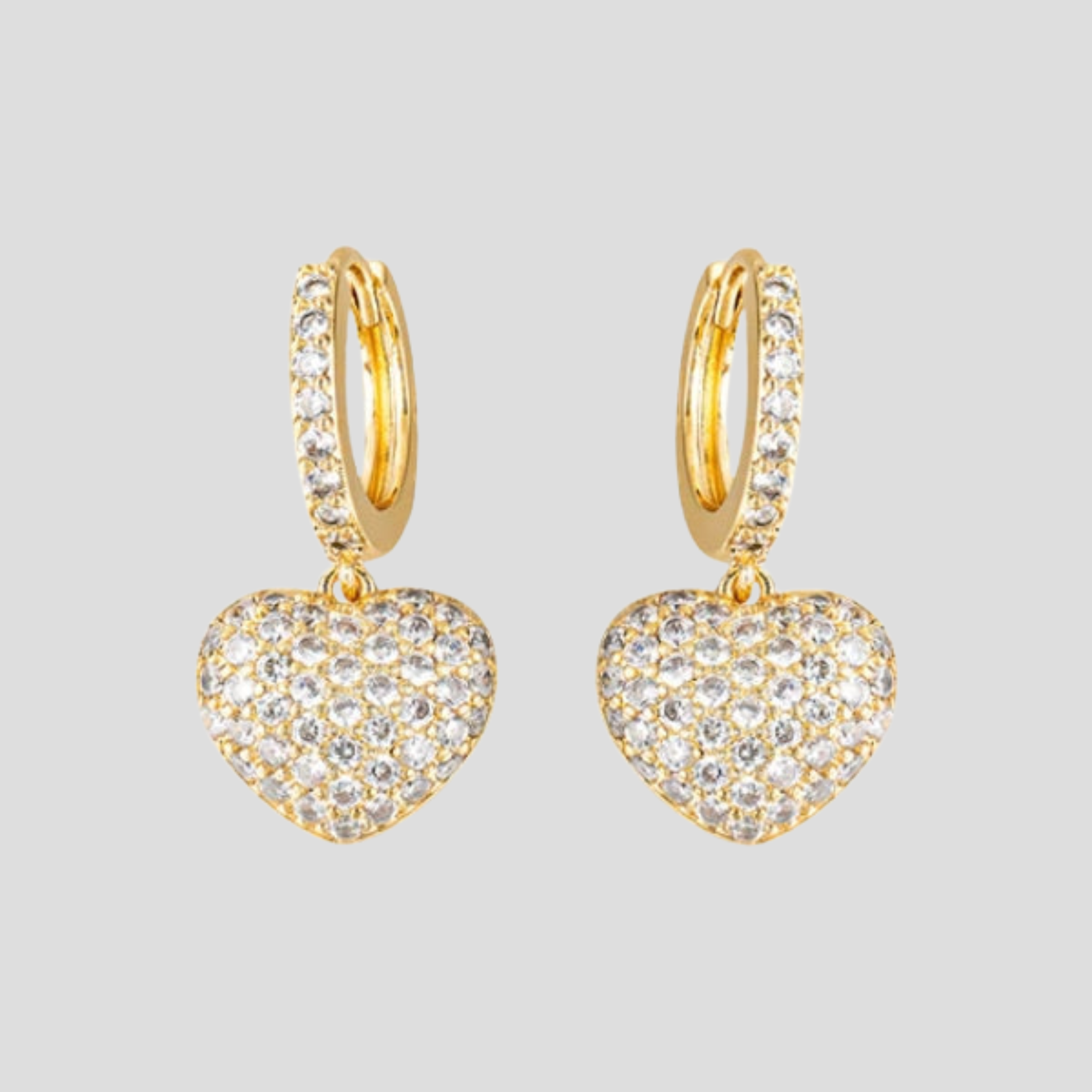 Heart charm pavé drop earrings shown in gold and silver finishes