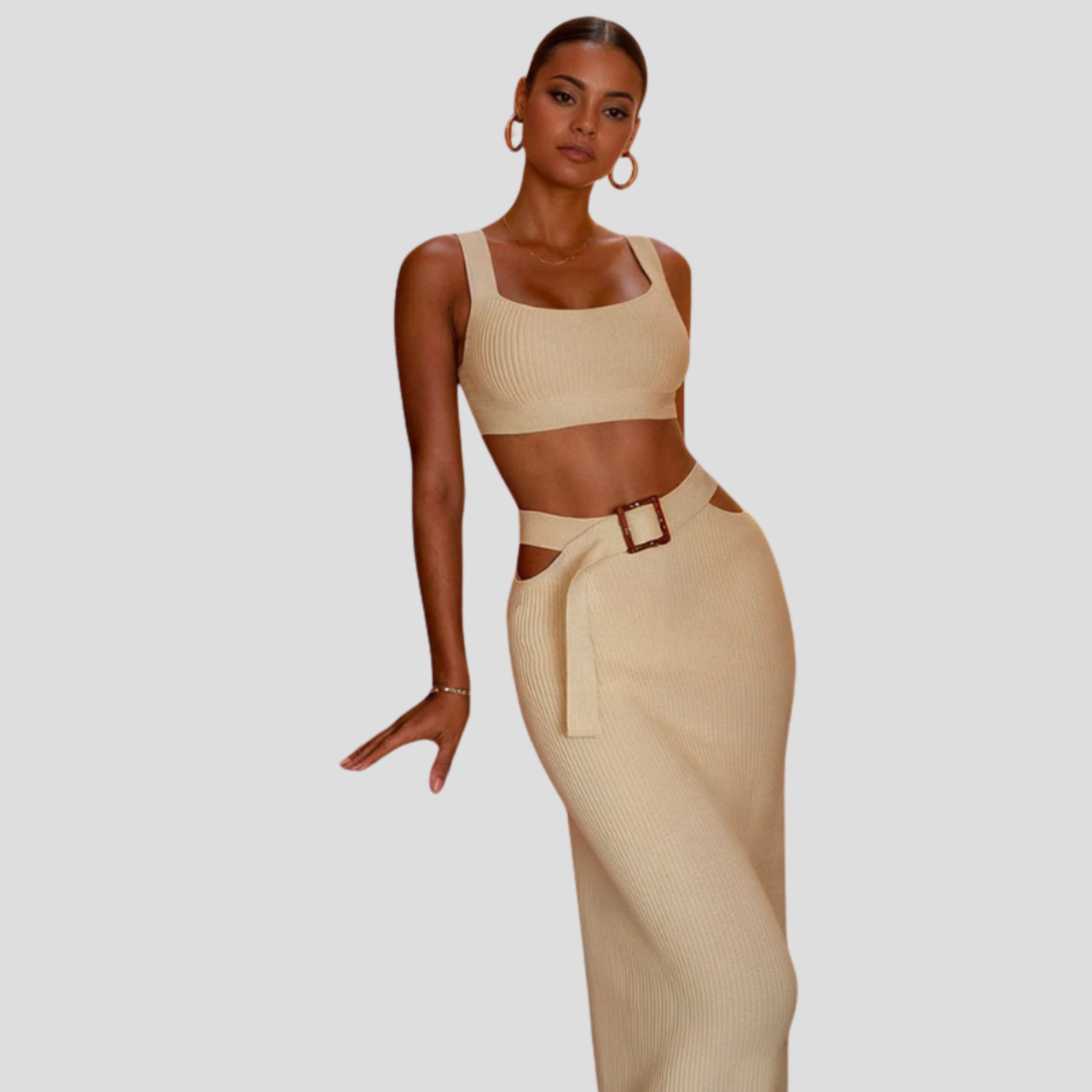 White women's two-piece set with wide-strap top and high-waist skirt for occasion wear