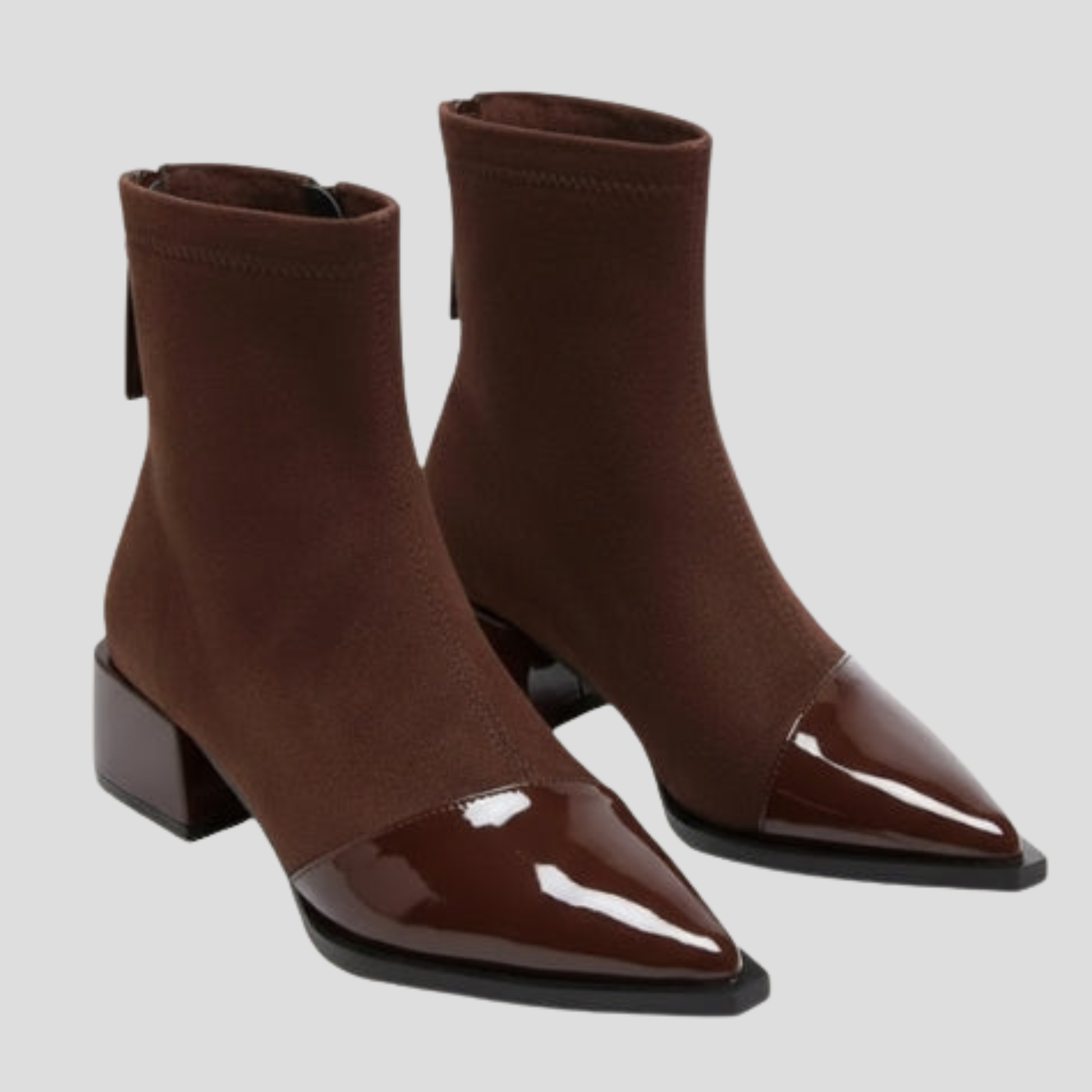 Women's ankle-height boots with contrast detail, shown in black and brown