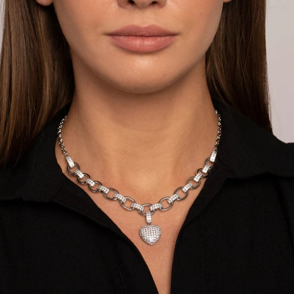 Women's jewelry set with oval chain and pavé heart pendant in gold and silver