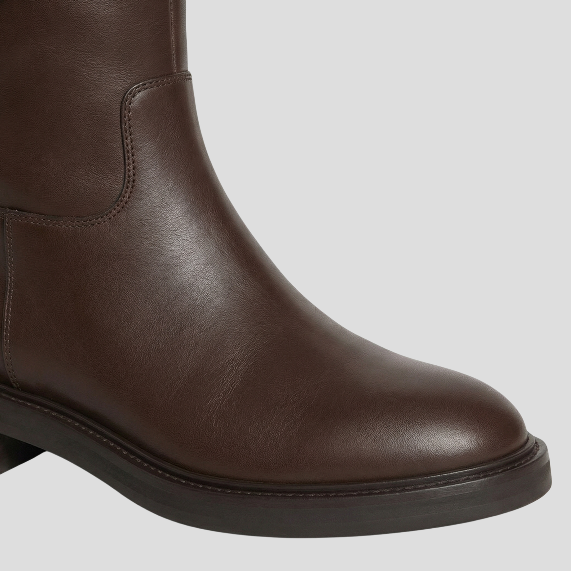 Women's tall structured shaft boots with clean vertical profile in black and brown