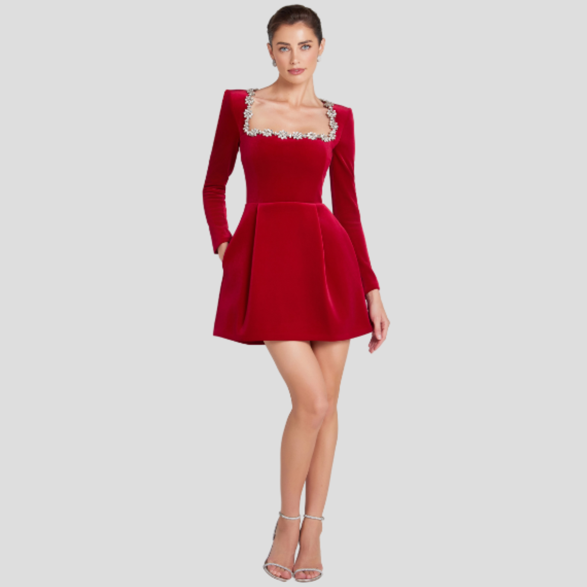 Women's structured cocktail dress with square neckline and embellished detailing in black