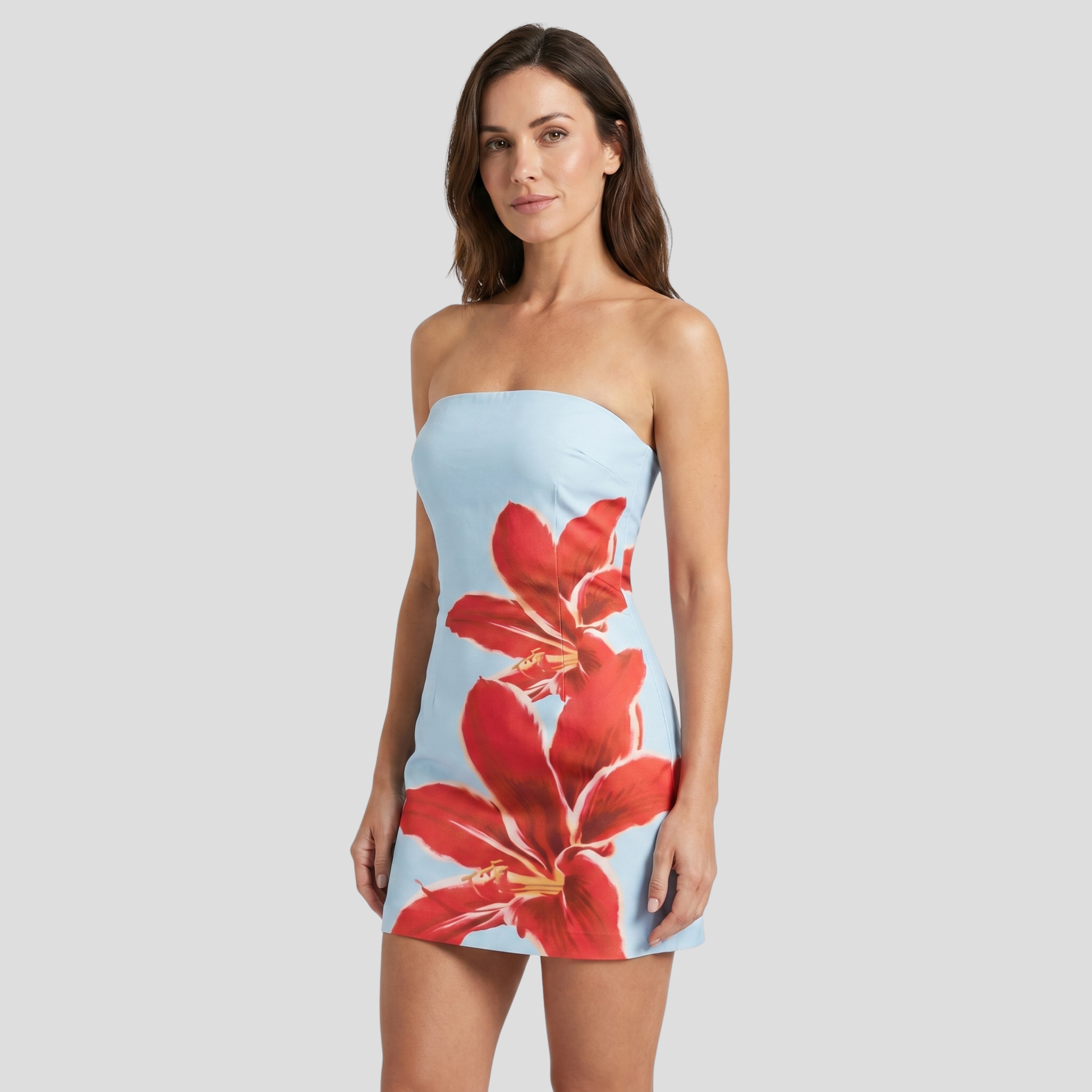 Women's strapless floral mini dress with fitted silhouette in black, blue, and white