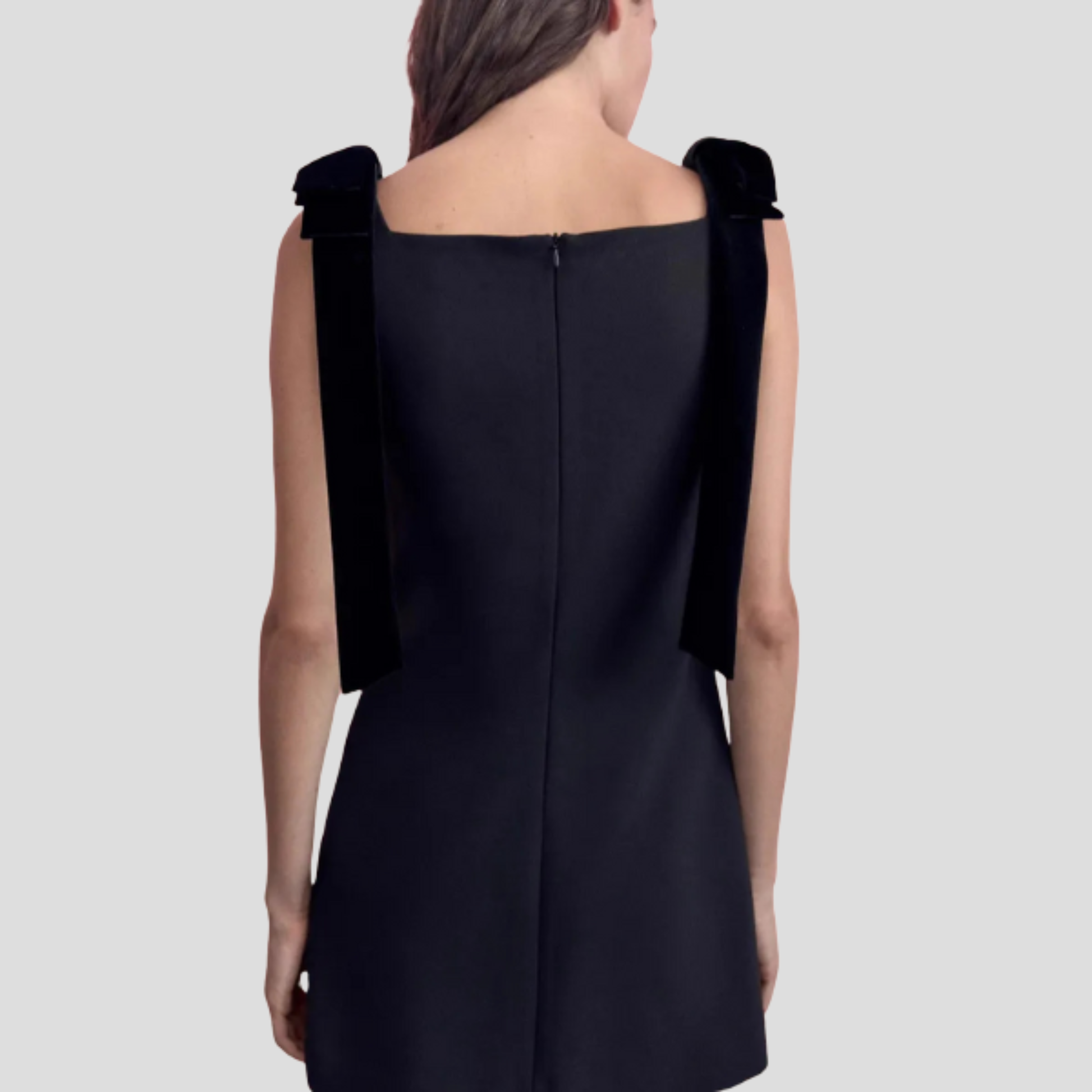 Black bow strap mini dress with A-line silhouette for evening wear