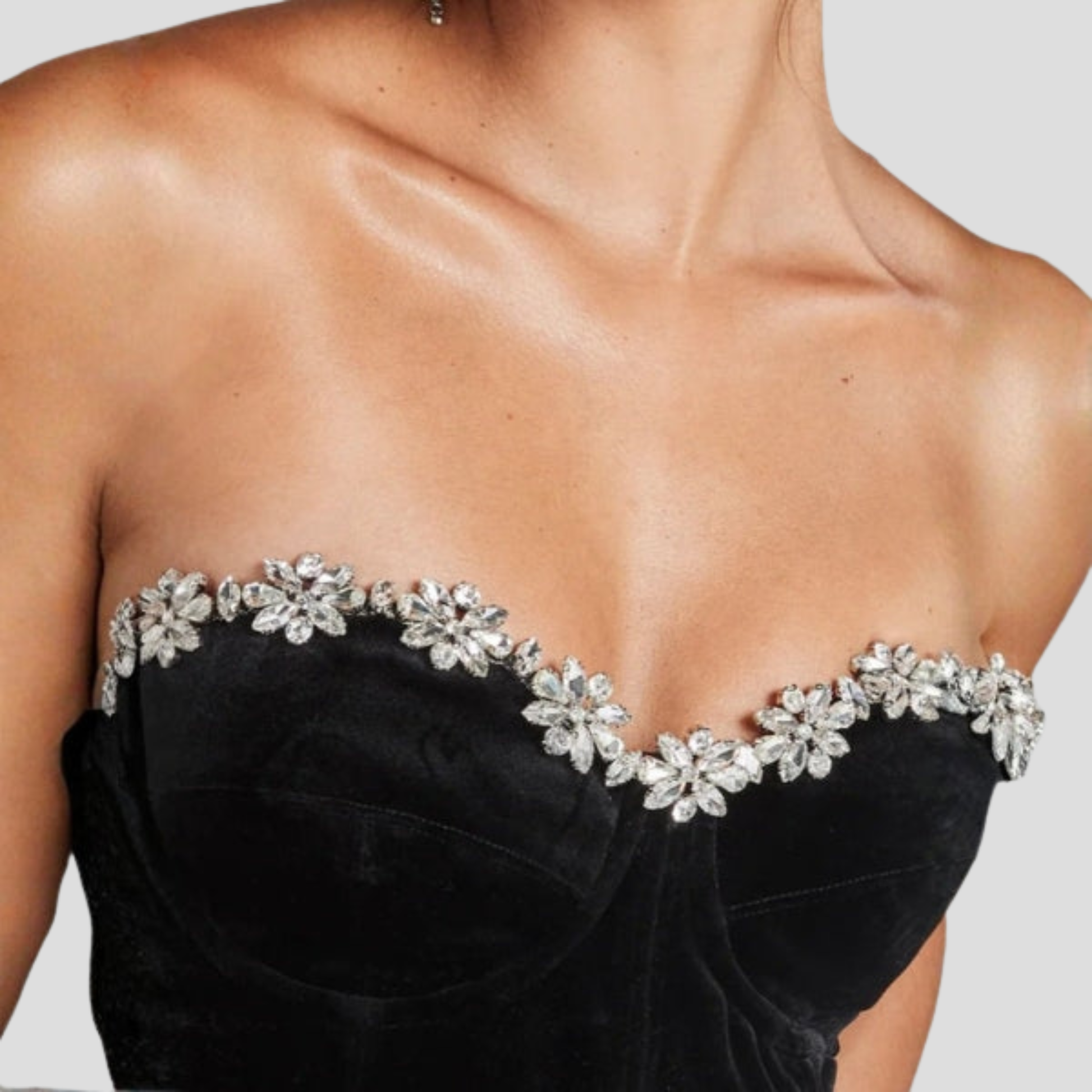 Black women's jumpsuit with sweetheart neckline and flared-leg silhouette
