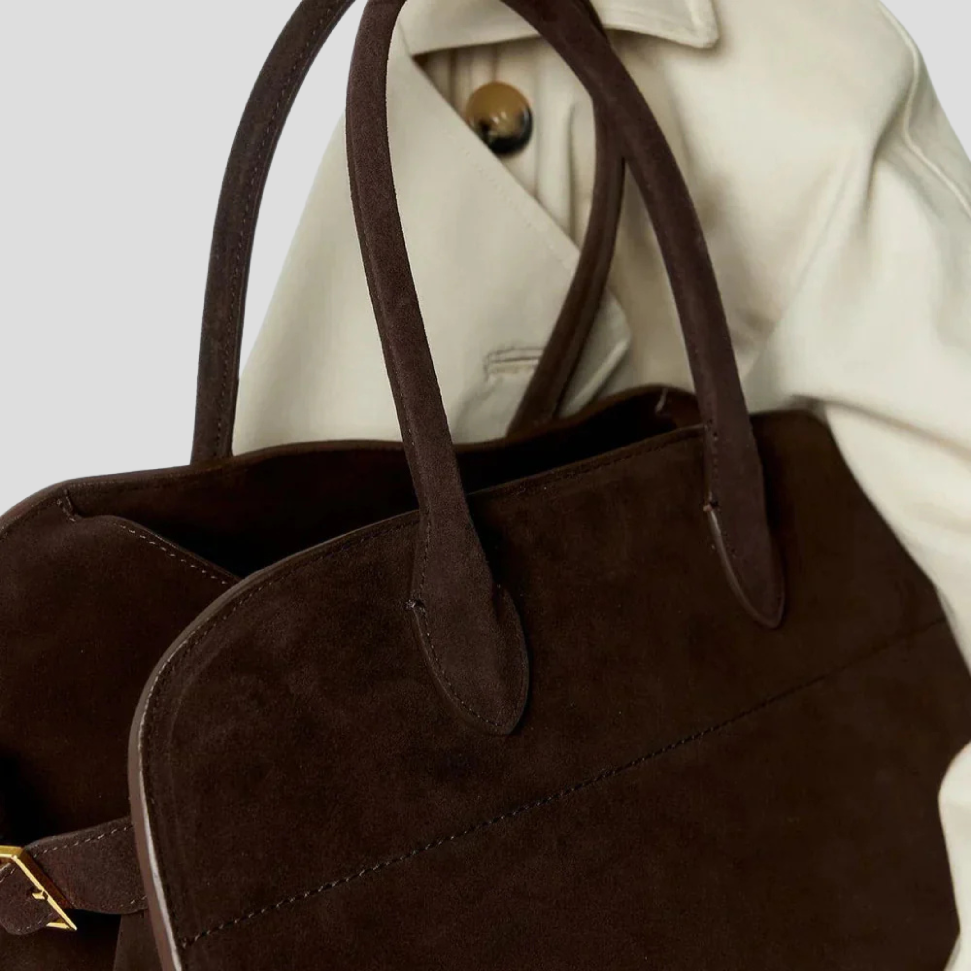 Brown structured tote bag with buckle detail for everyday wear