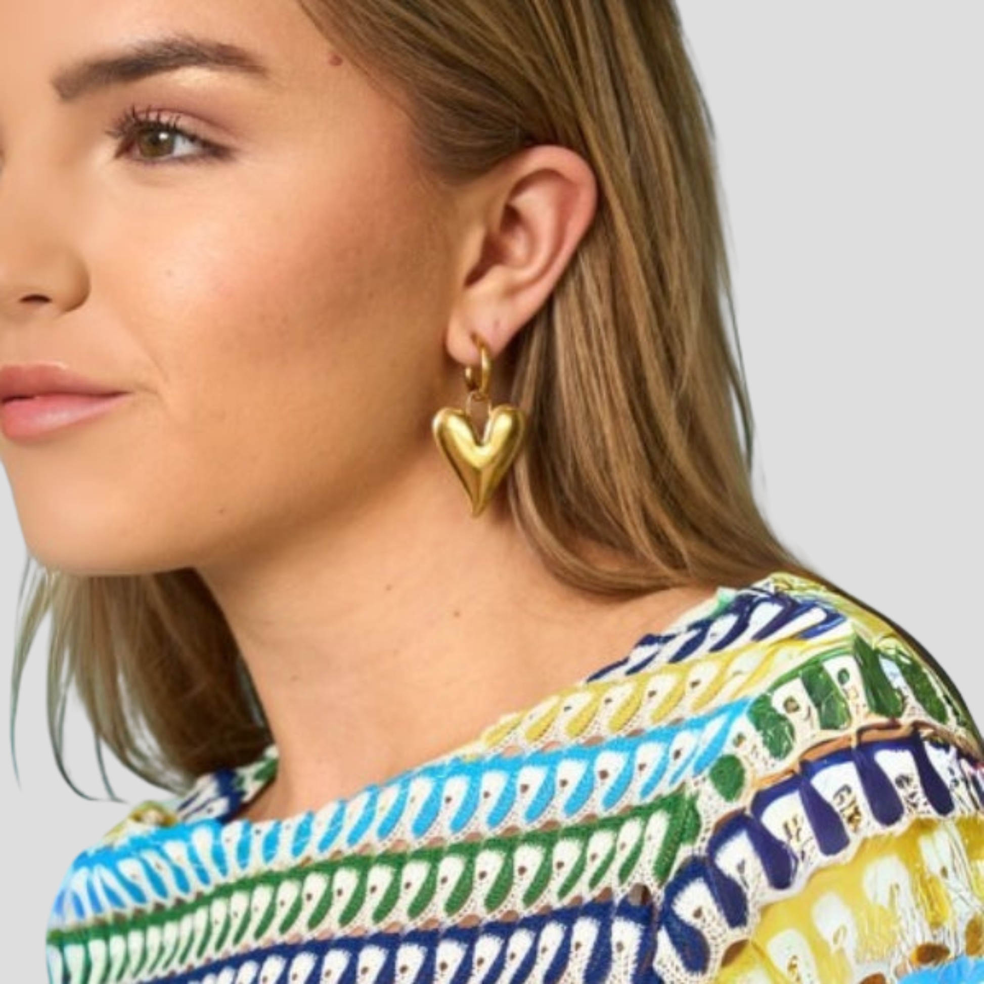 Gold-tone sculpted heart outline earrings for everyday wear