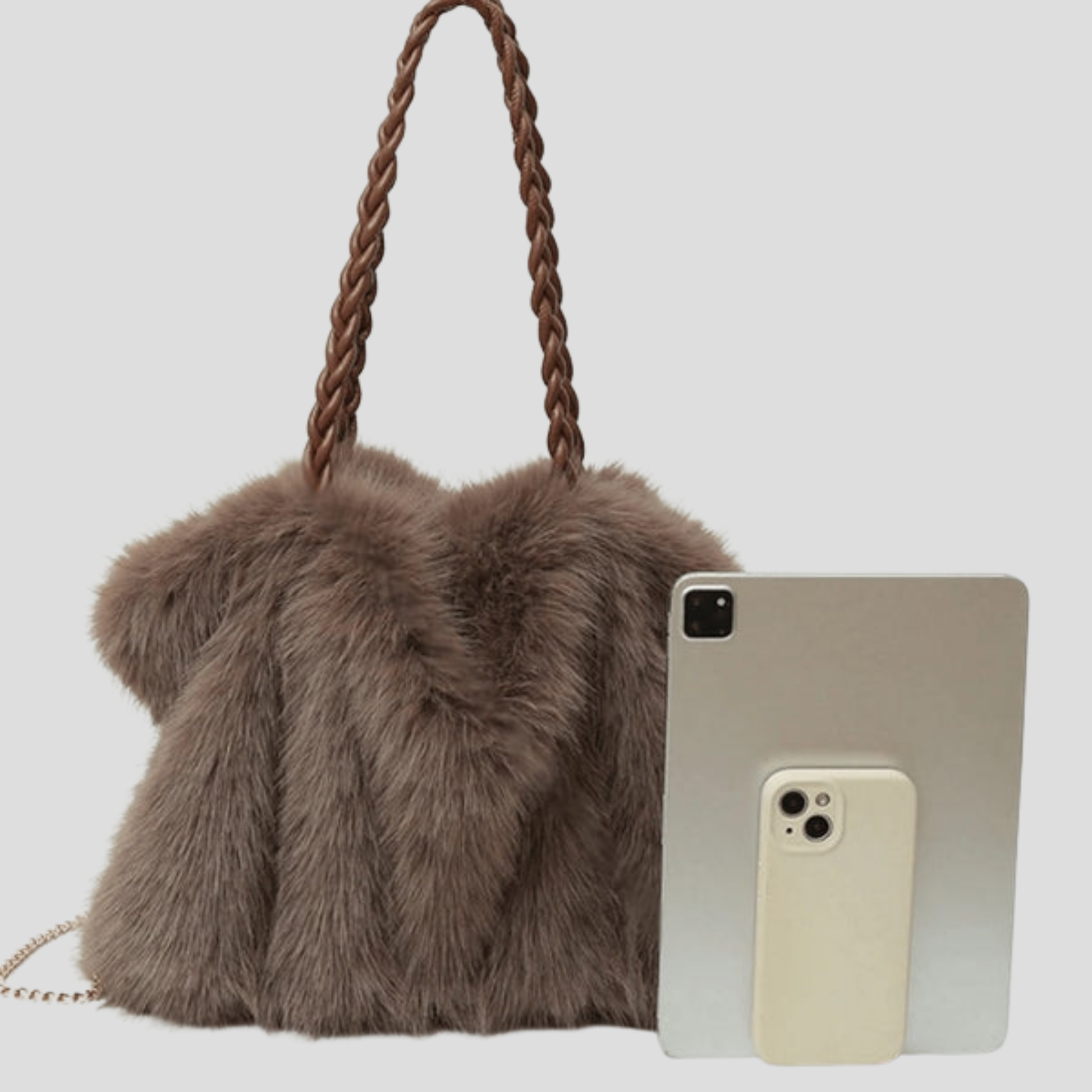Oversized tote bag with braided handle detail, shown in black, brown, and beige