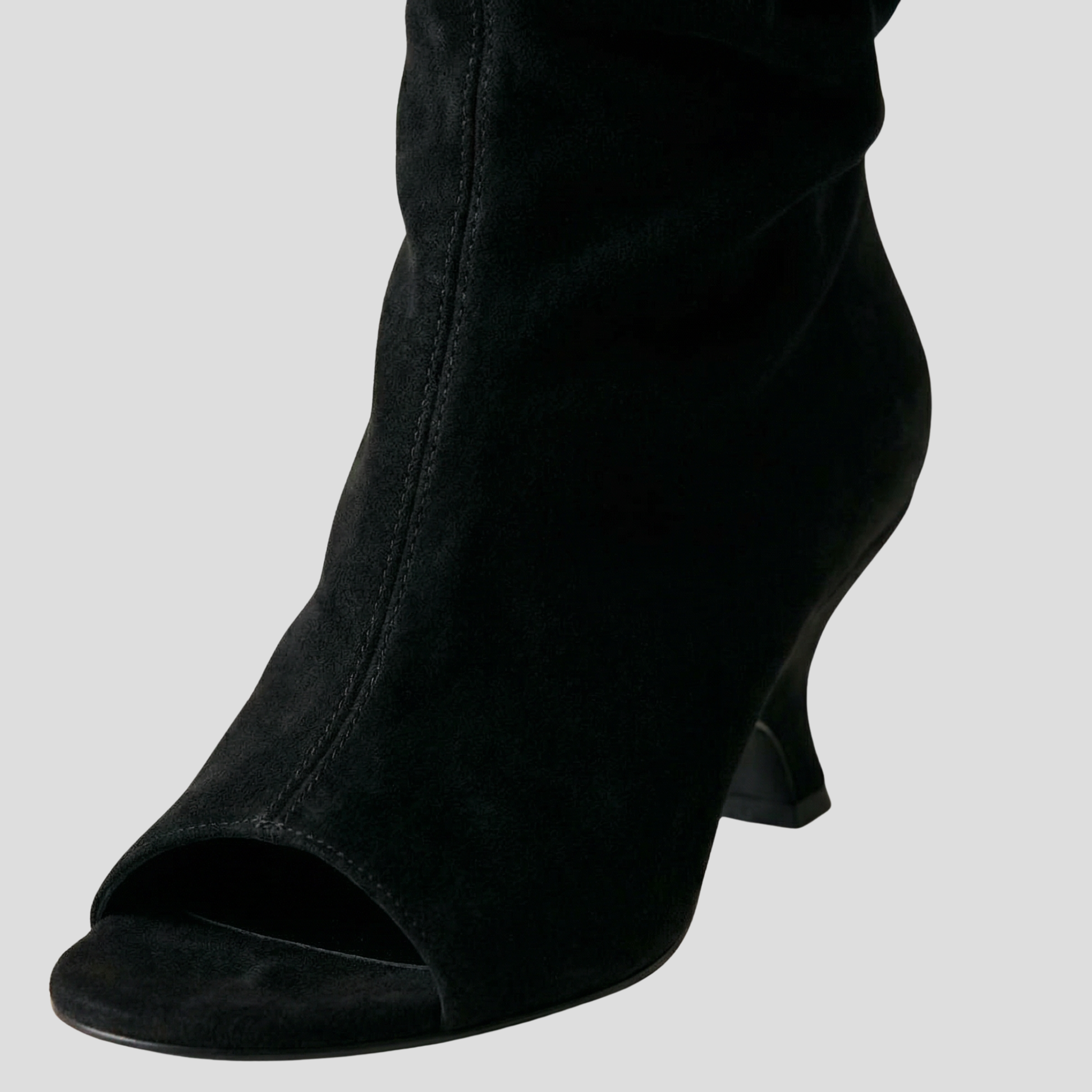 Women's open-toe knee-high boots with a clean vertical structure, shown in a neutral tone