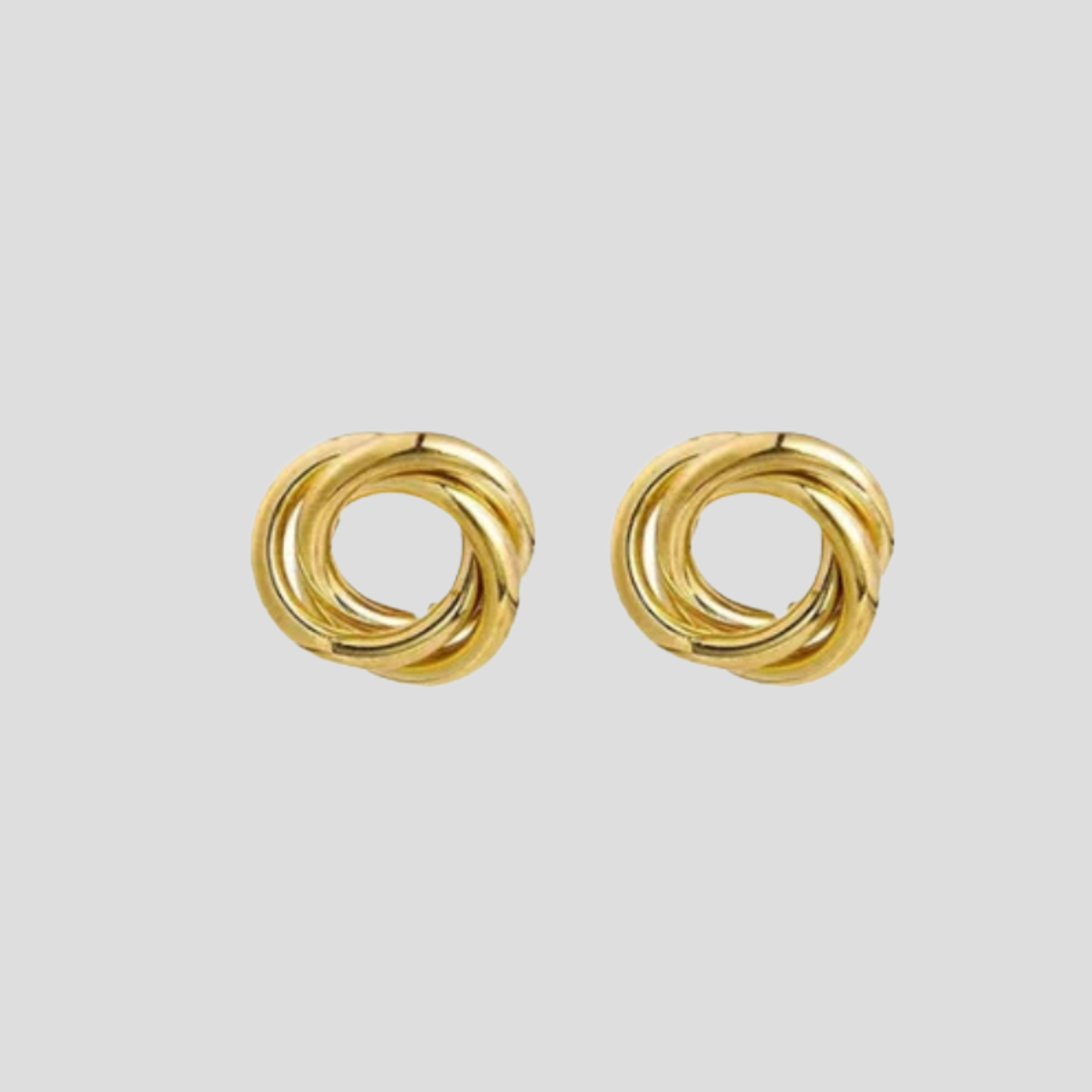 Gold-tone interwoven knot stud earrings with a polished outline for everyday wear
