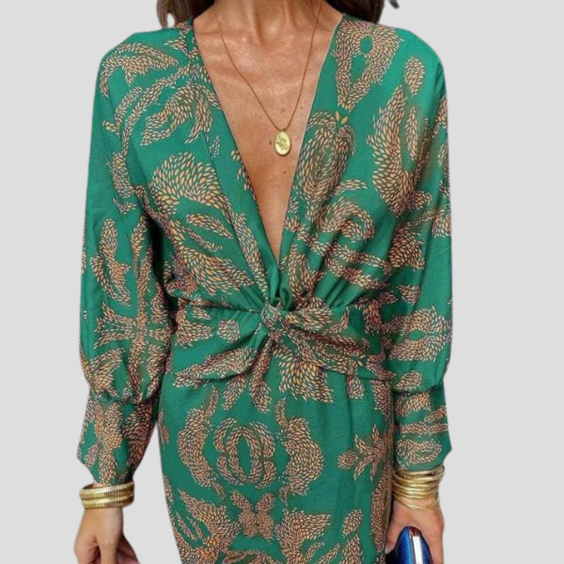 Women's flowing midi dress with defined waist shown in blue, green, red and purple