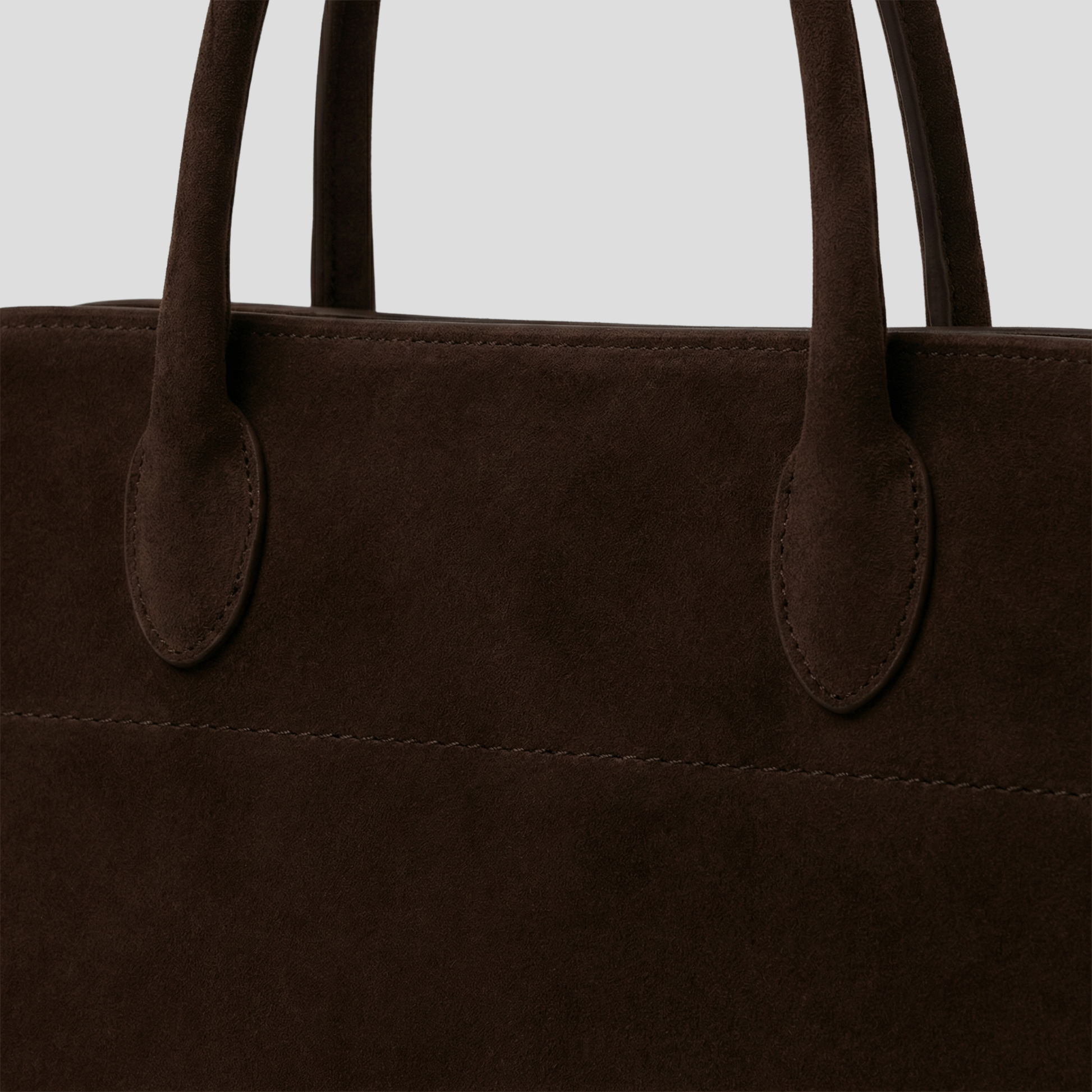 Brown structured tote bag with buckle detail for everyday wear