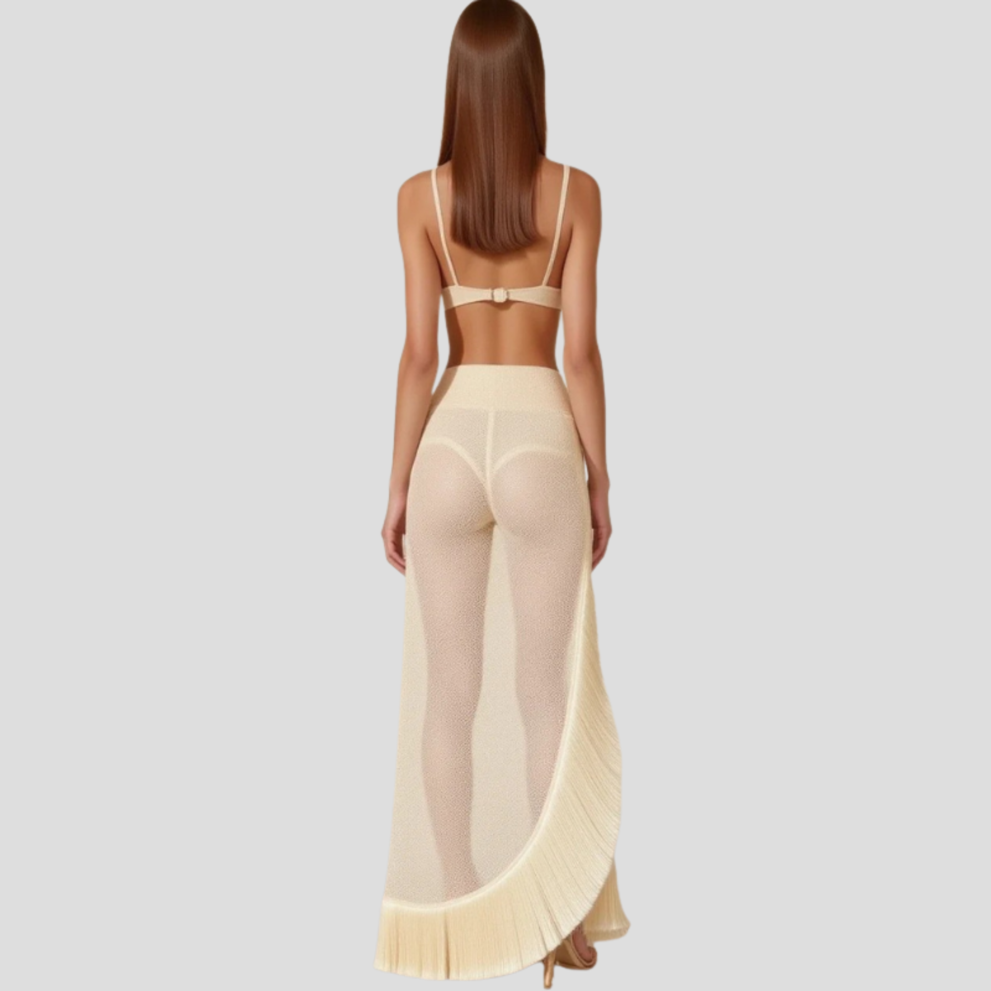 White two-piece set with fitted bralette top and flowing fringe maxi skirt for occasion wear