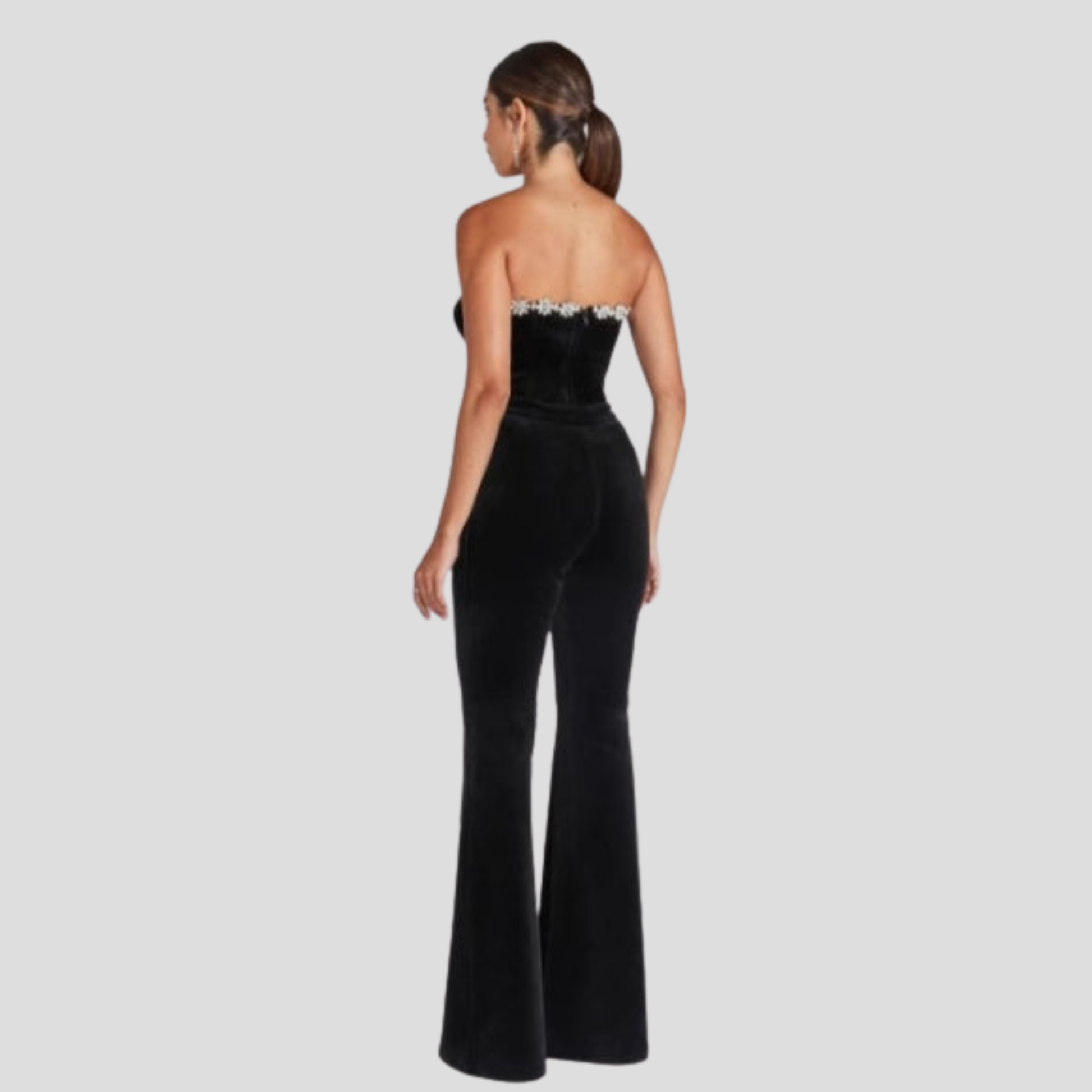 Black women's jumpsuit with sweetheart neckline and flared-leg silhouette