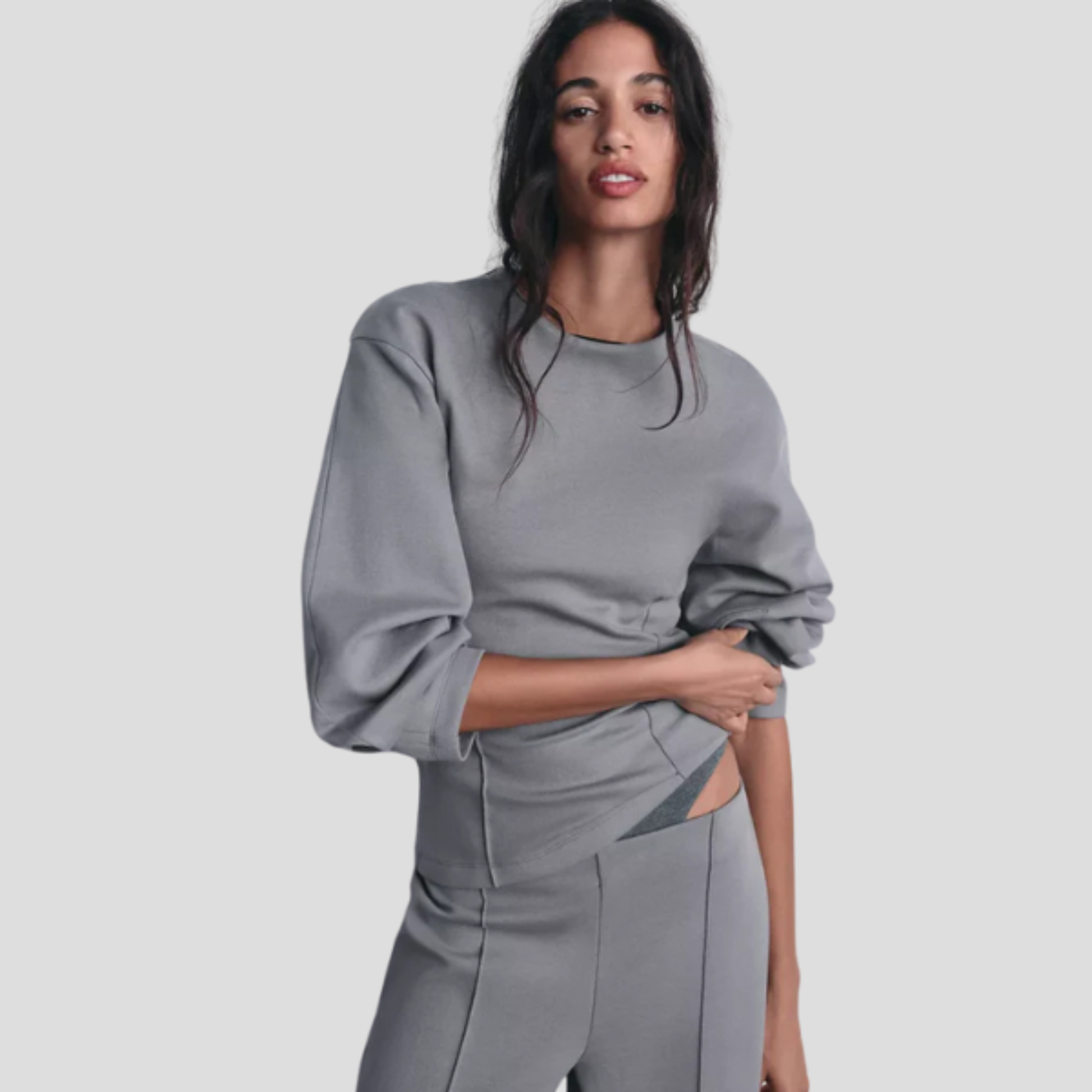 Women's gray coordinated lounge set with relaxed top and matching bottom