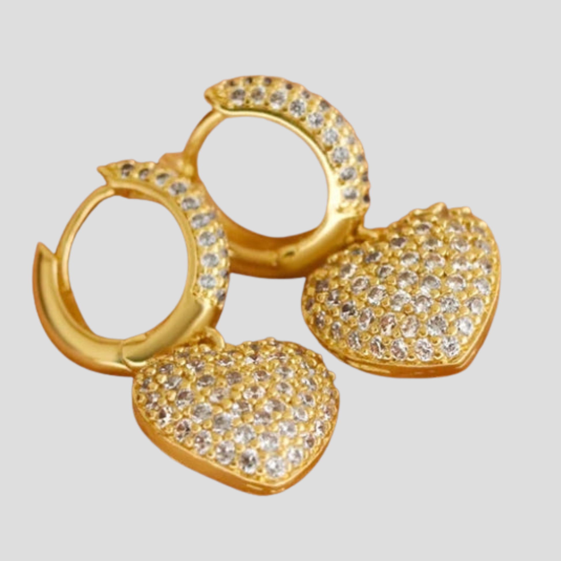 Heart charm pavé drop earrings shown in gold and silver finishes