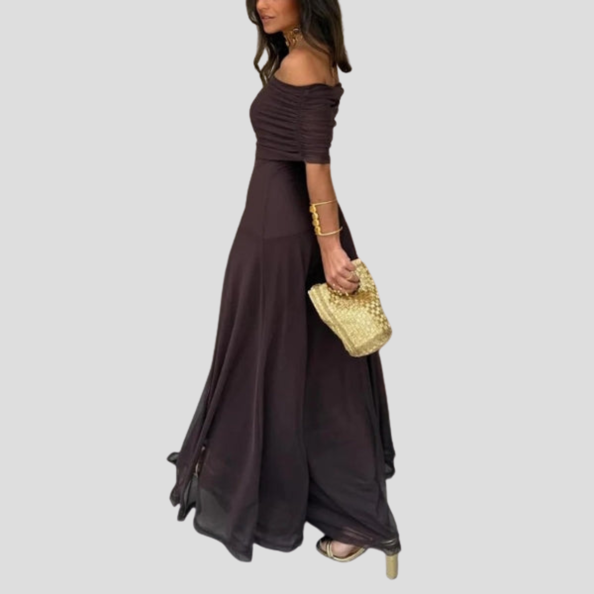 Brown off-shoulder maxi dress with sheer overlay and floor-length silhouette for evening wear