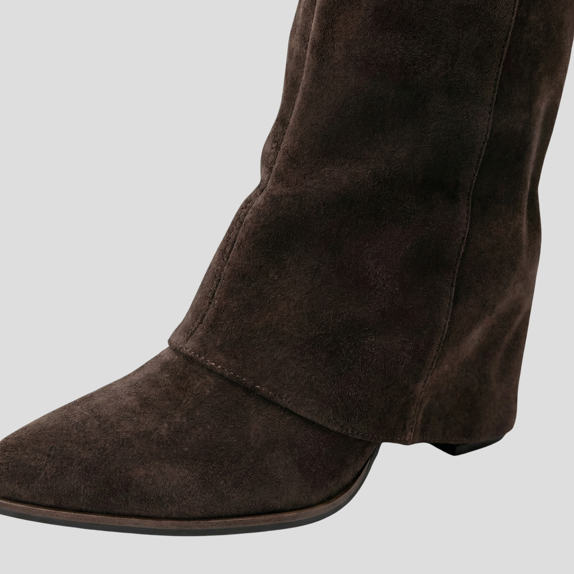 Women's knee-high boots with flared shaft and sculpted silhouette in neutral tones