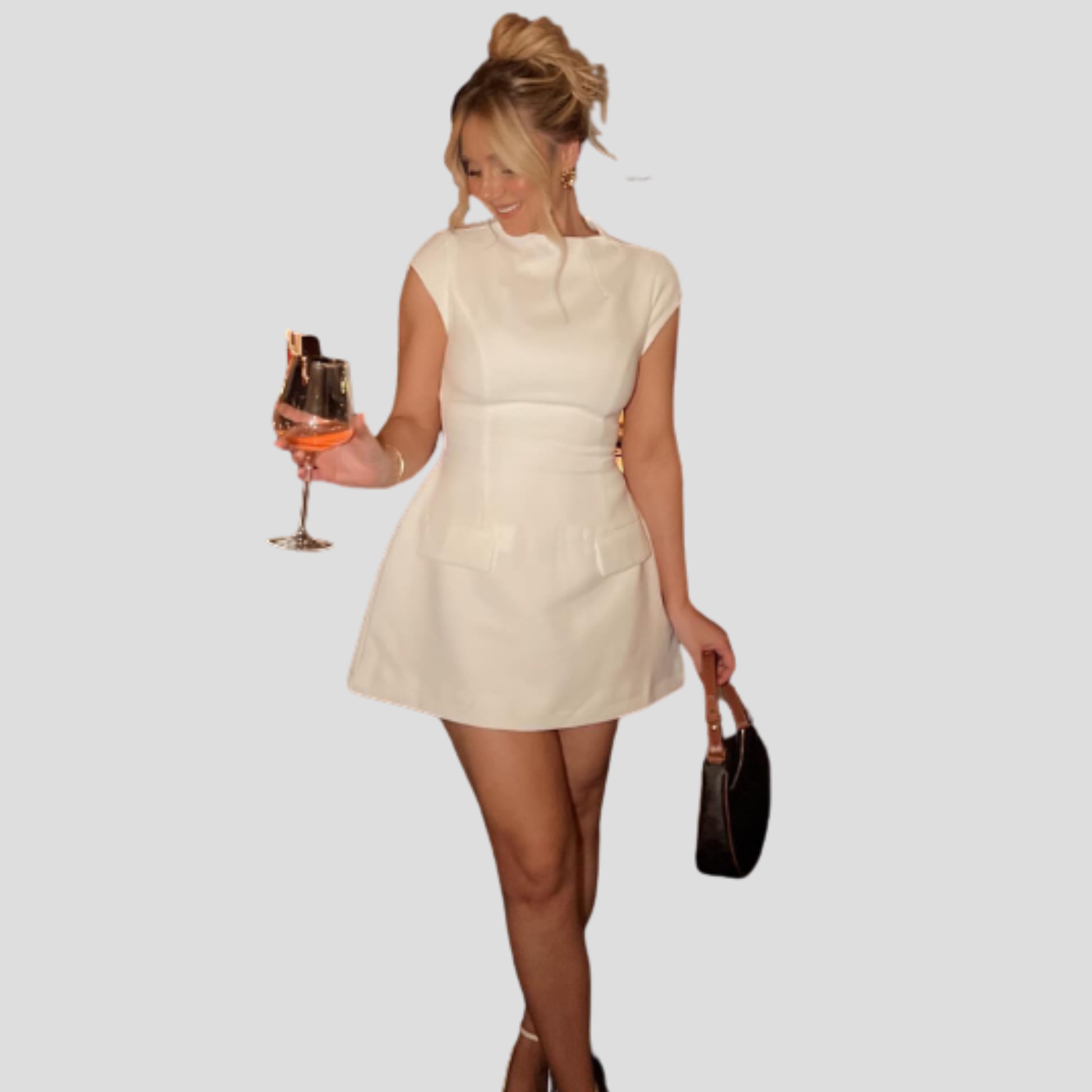 Women's cap sleeve mini dress with structured pocket flap detailing in black
