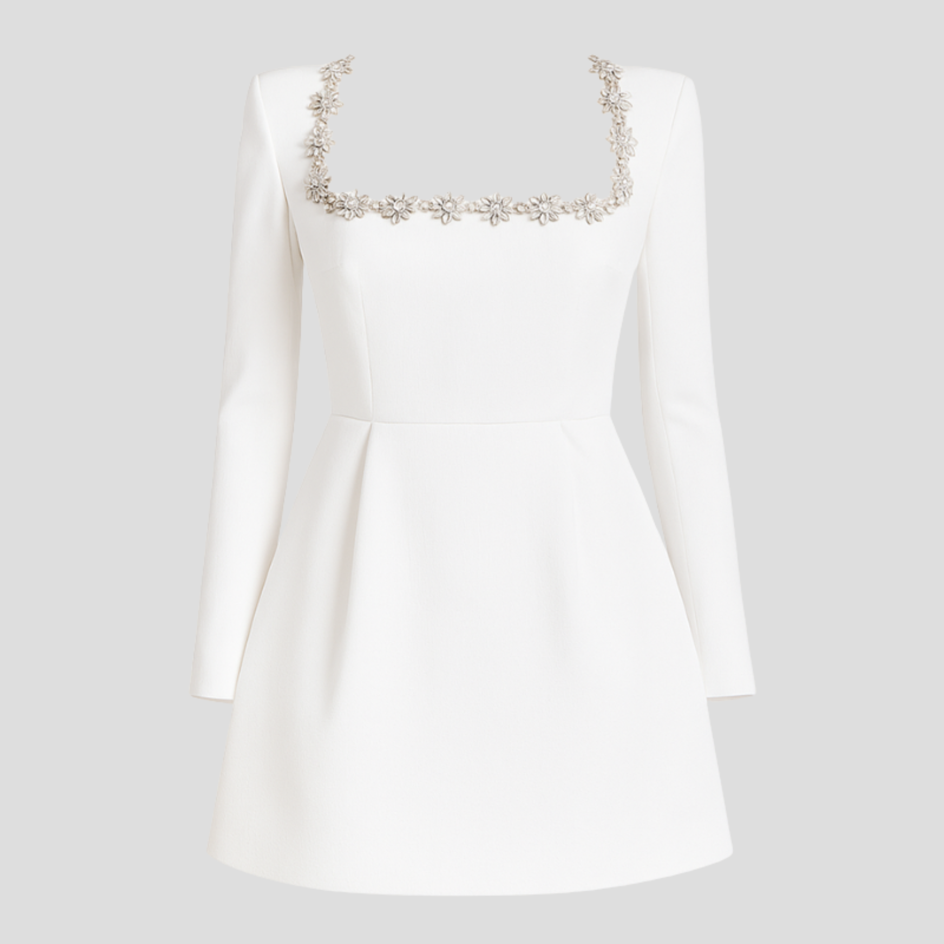 Women's structured cocktail dress with square neckline and embellished detailing in black