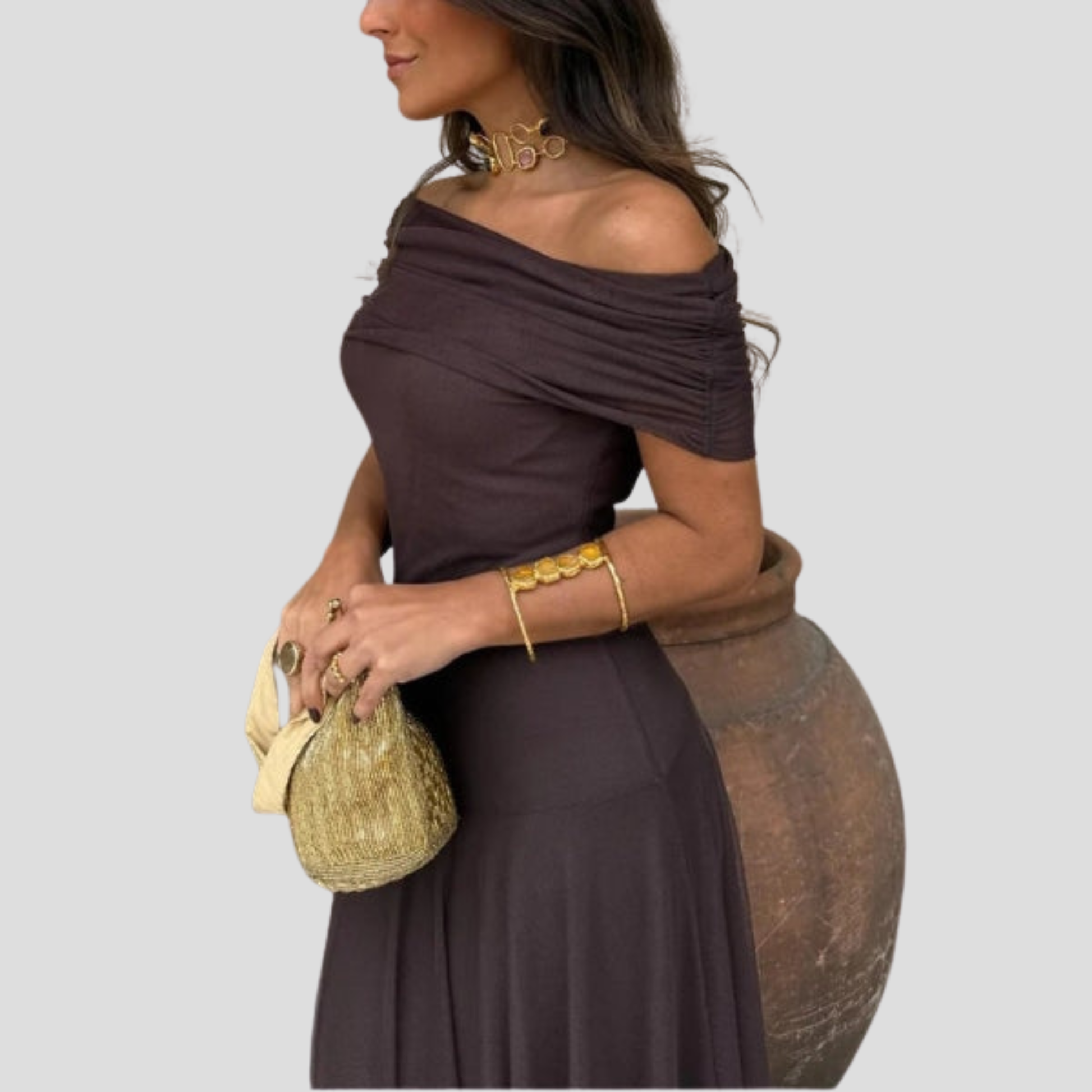 Brown off-shoulder maxi dress with sheer overlay and floor-length silhouette for evening wear