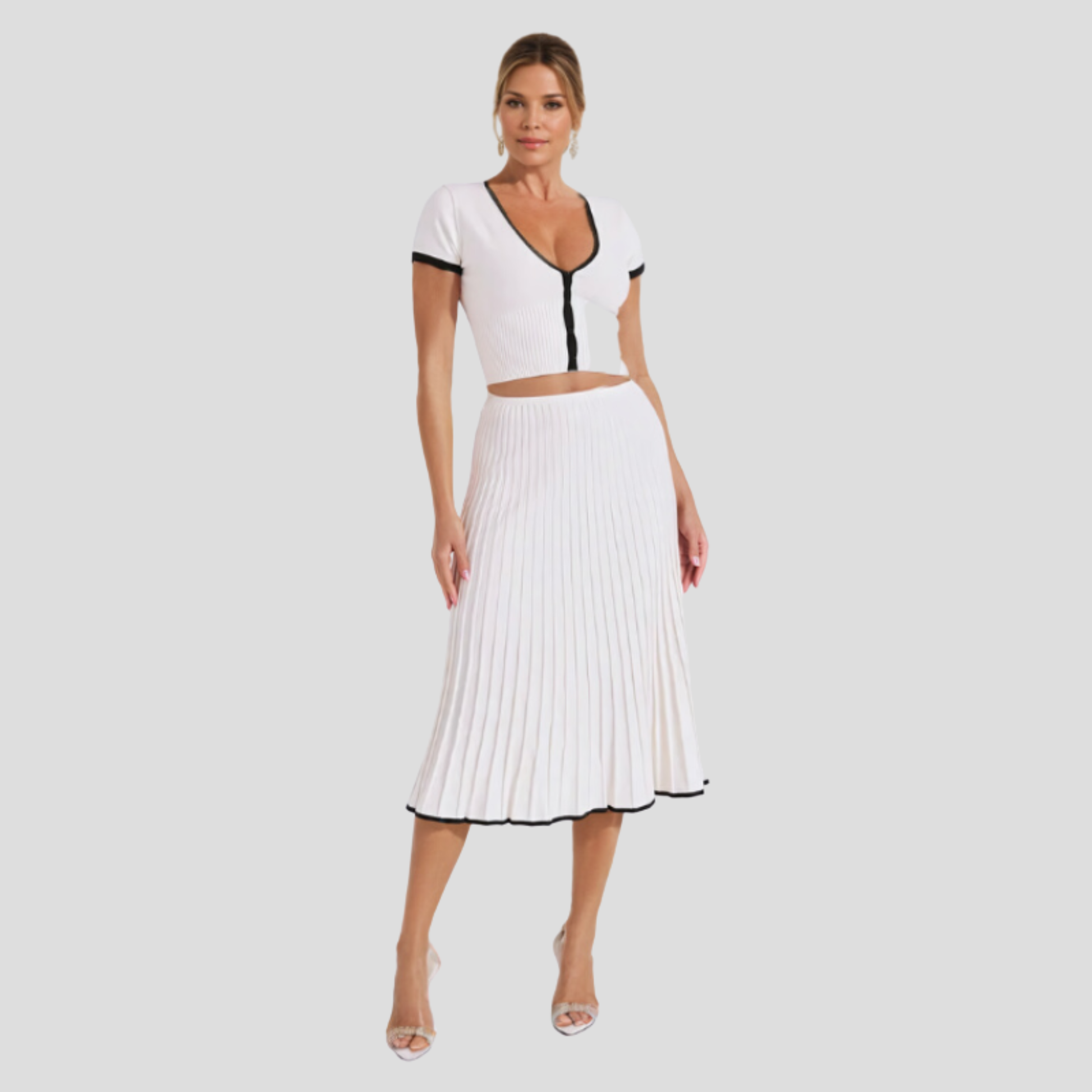 Ivory white two-piece set with cropped button-front top and pleated skirt