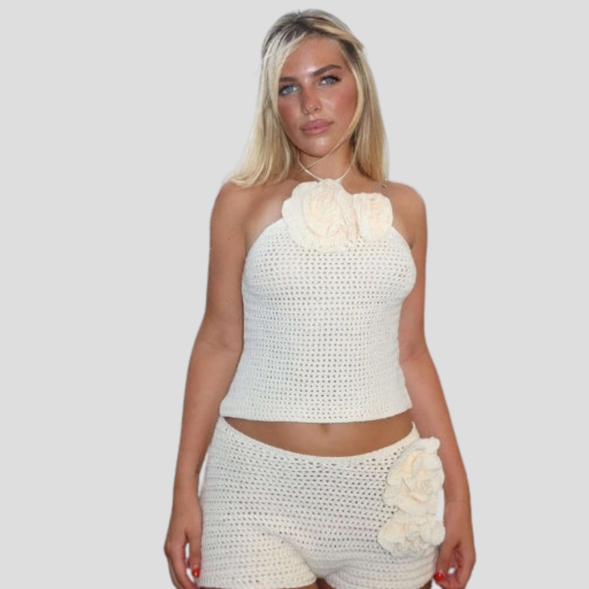 Women's white two-piece short set with halter top and high-rise shorts