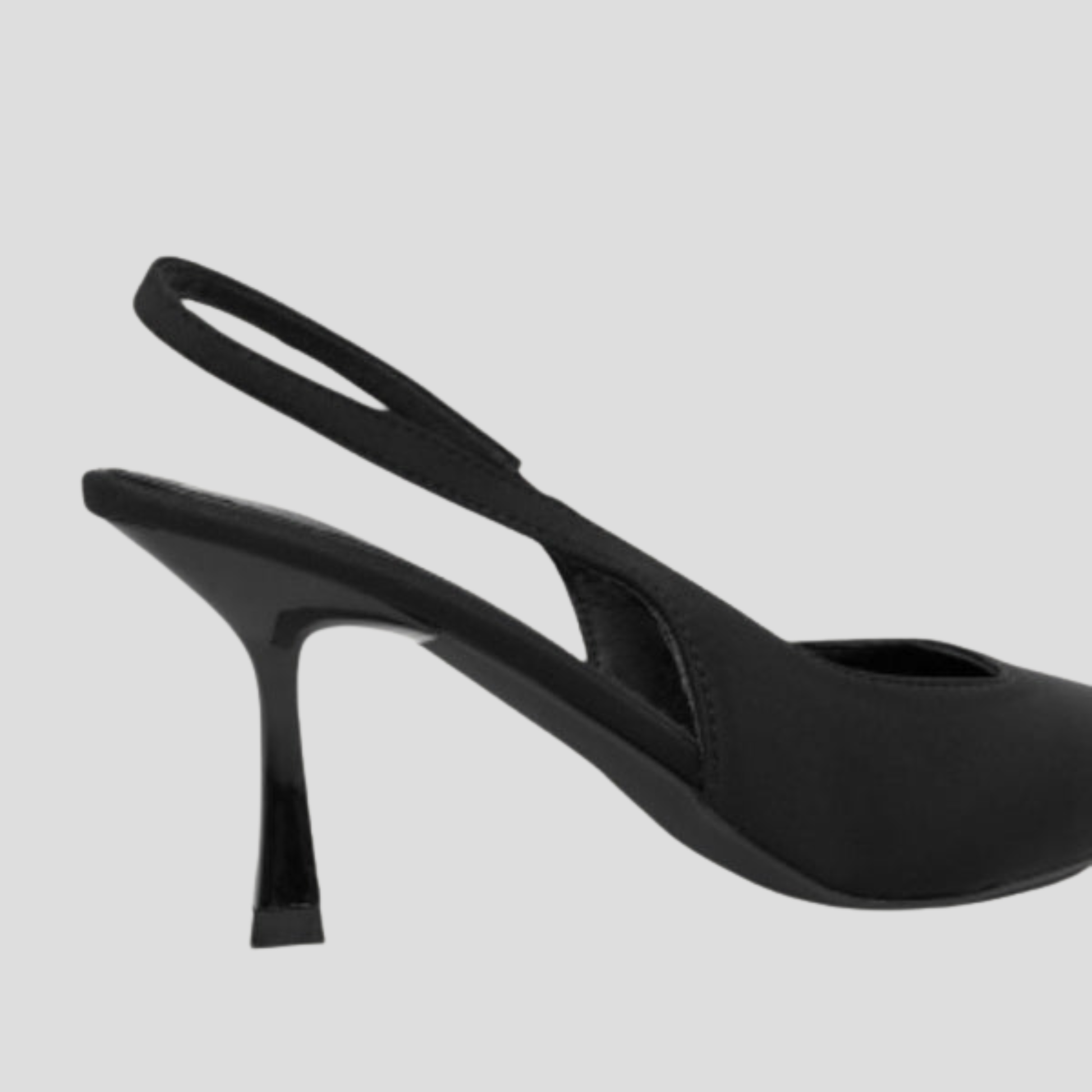 Black pointed toe slingback heel for evening wear