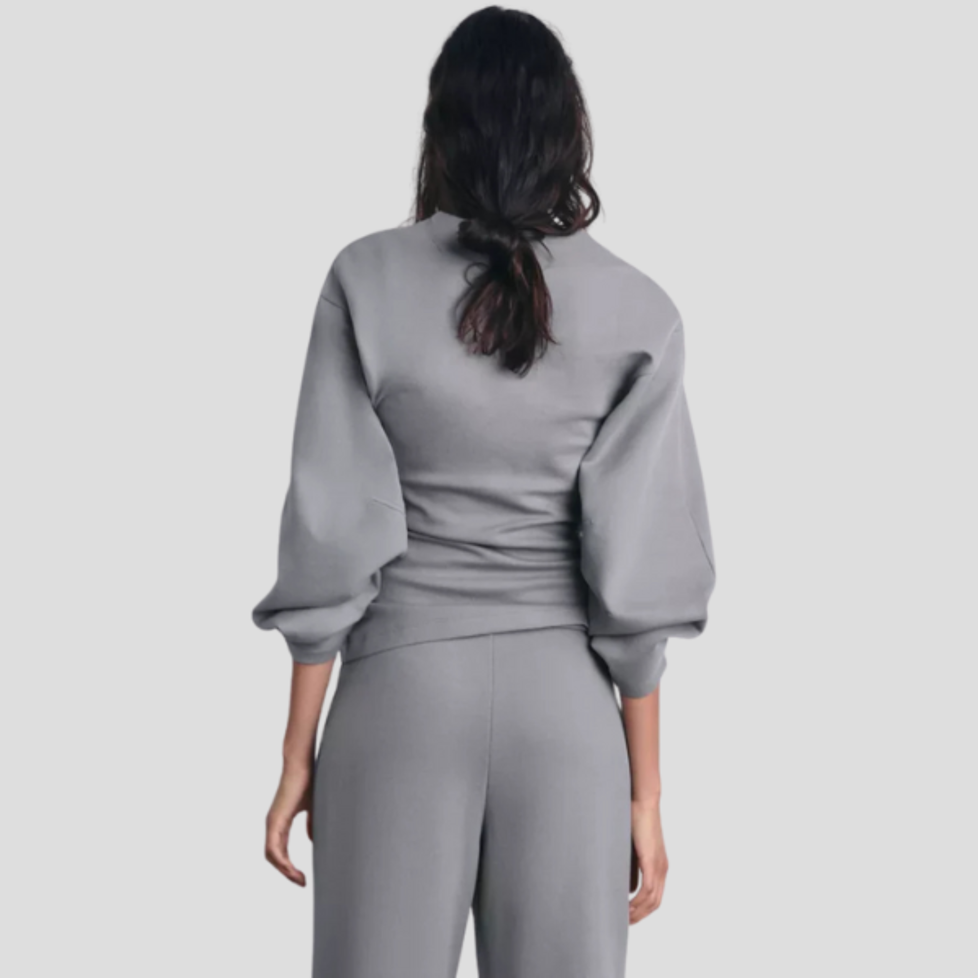 Women's gray coordinated lounge set with relaxed top and matching bottom
