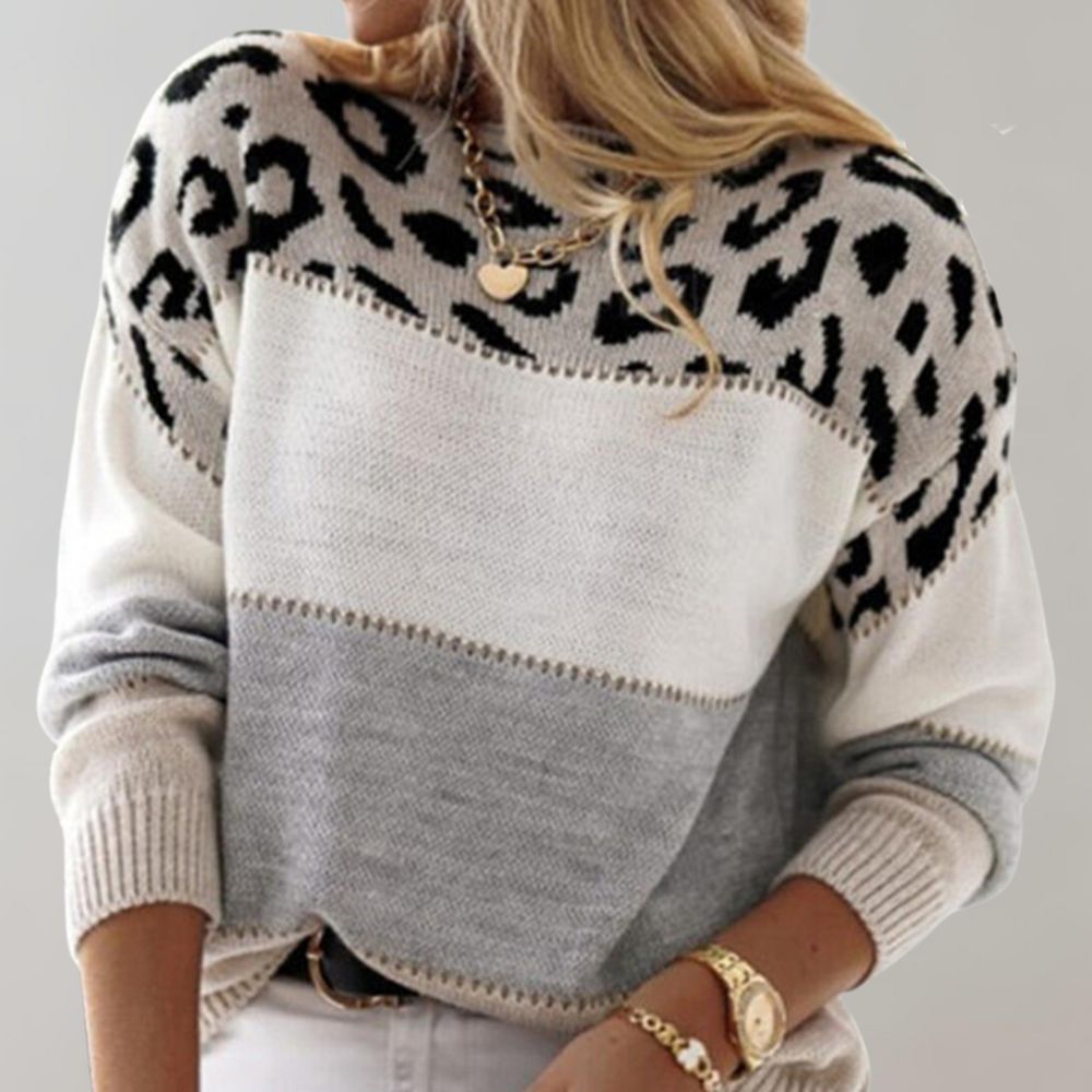 Woman's warm classic knit jumper shown in grey and pink