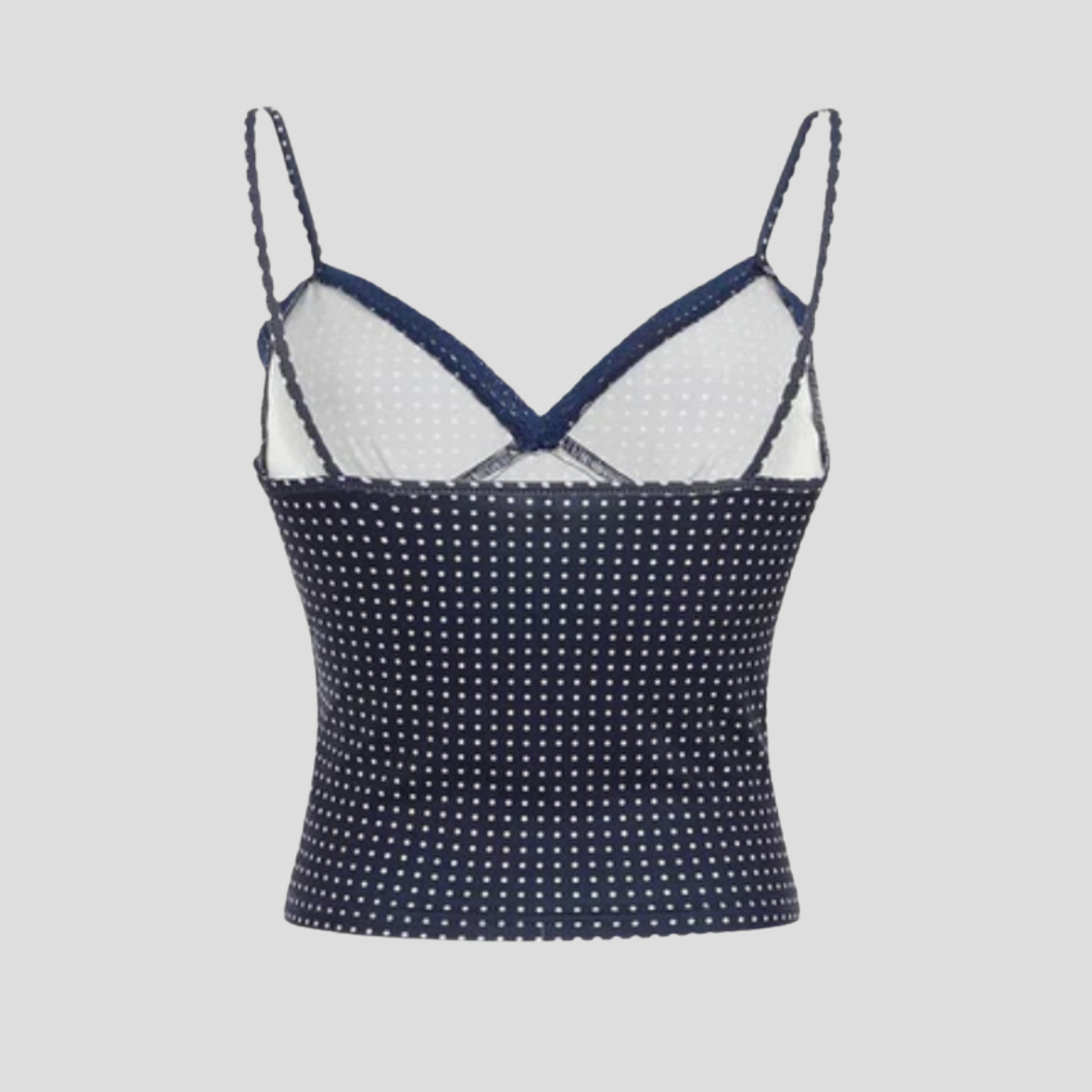 Blue polka dot crop top with delicate lace edge detailing and contoured fit