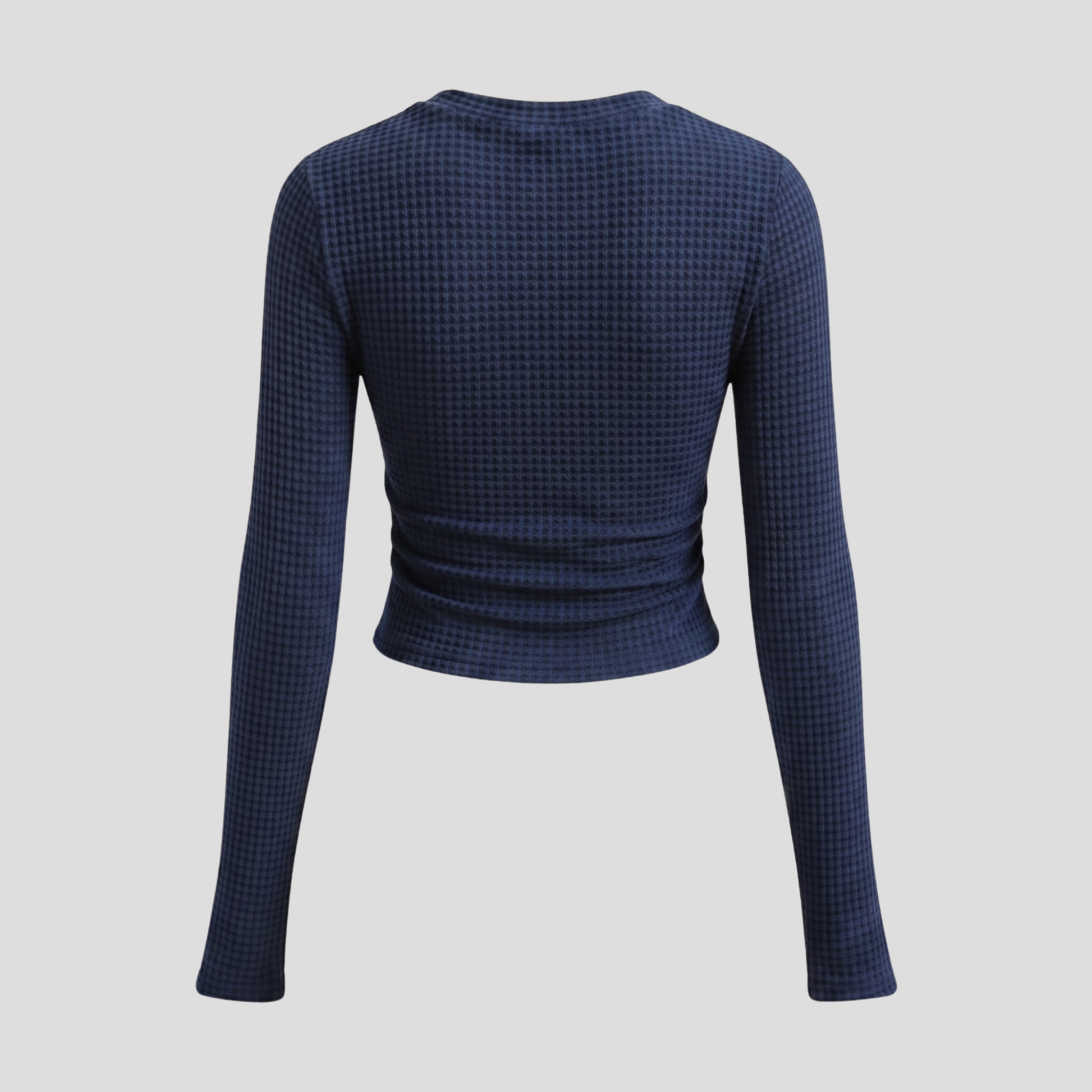 Women's textured long-sleeve top with contoured lines, shown in neutral tones
