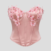 Strapless corset-style top with sweetheart neckline and 3D floral appliqué detail