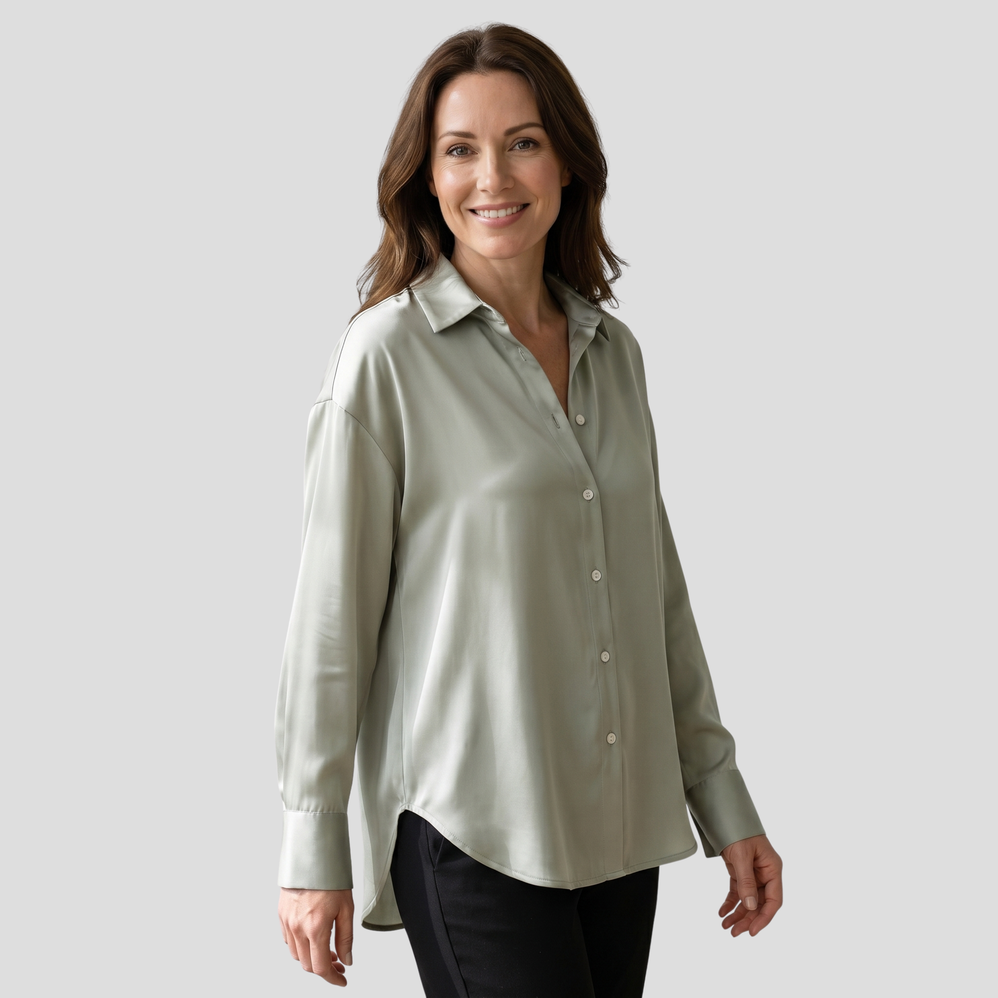 Women's draped relaxed-fit blouse with soft flowing lines, shown in a neutral color