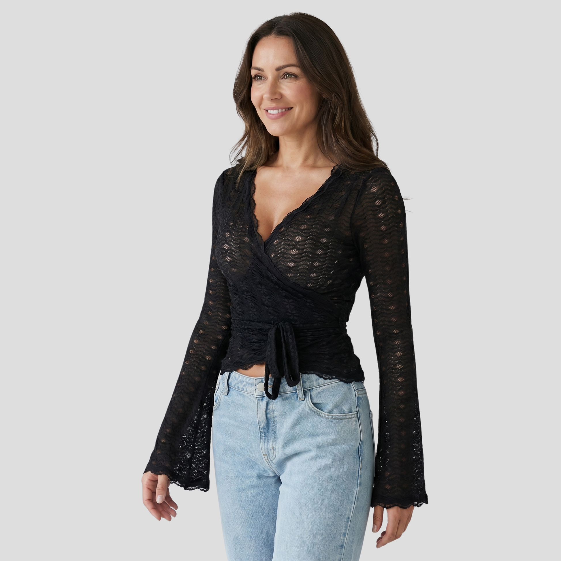 Black women's wrap top with cross-over front and lace pattern detailing