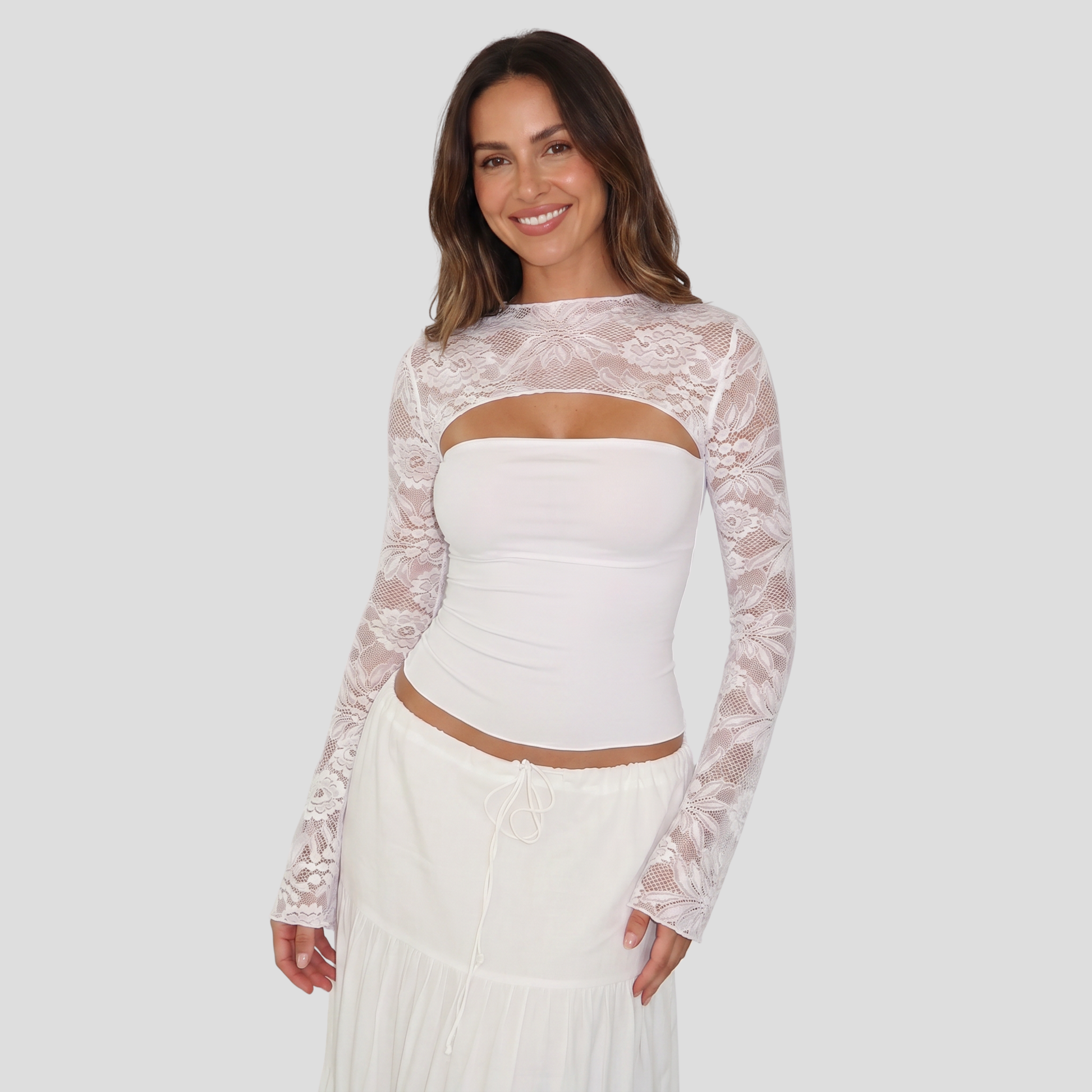 Women's long-sleeve top with cut-out neckline and lace-detailed sleeves