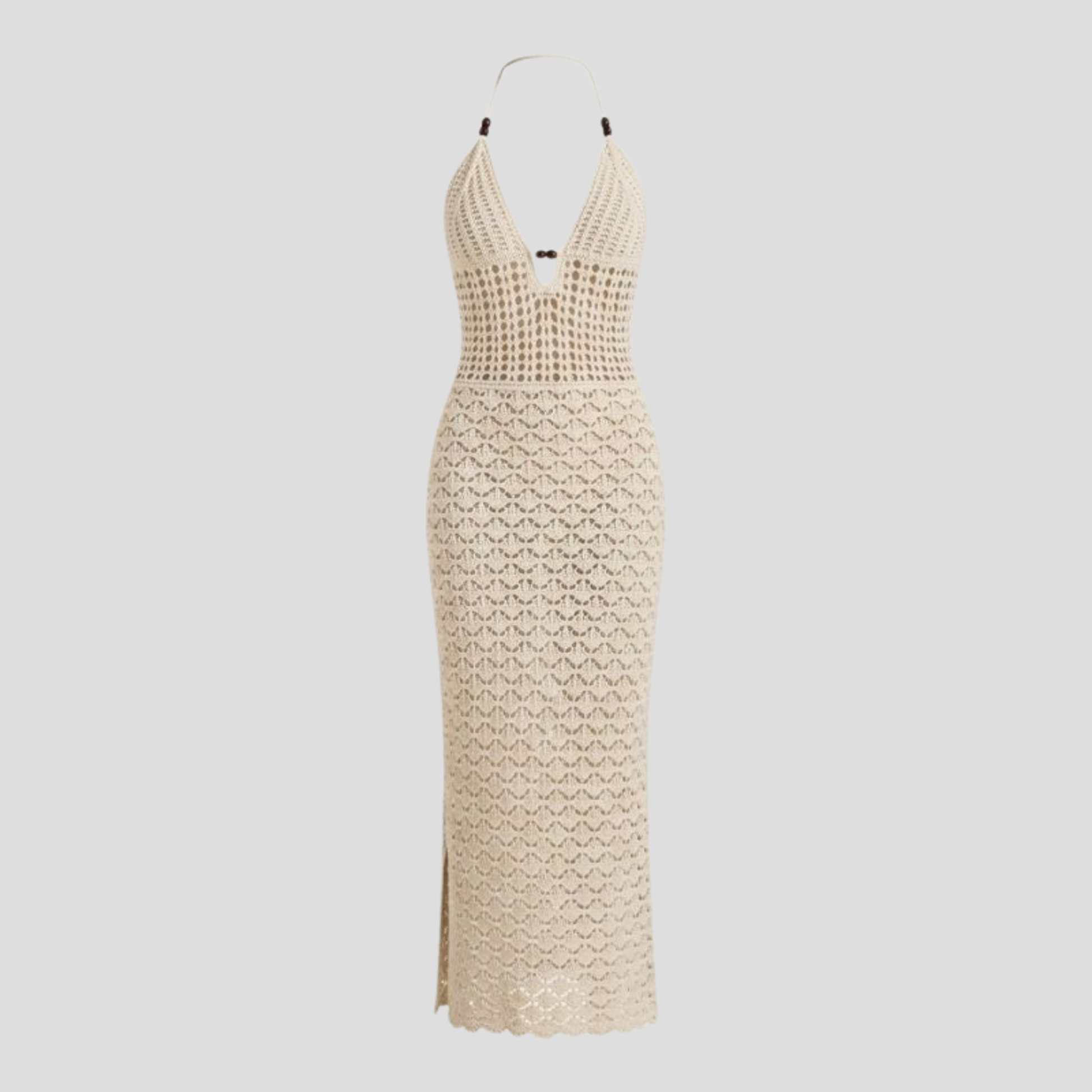 White halter neckline maxi dress with open-back detail and open-work pattern