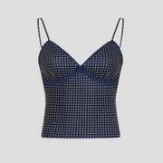 Blue polka dot crop top with delicate lace edge detailing and contoured fit