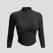 Women's long-sleeve top with high neckline and corset seam detailing in black and white