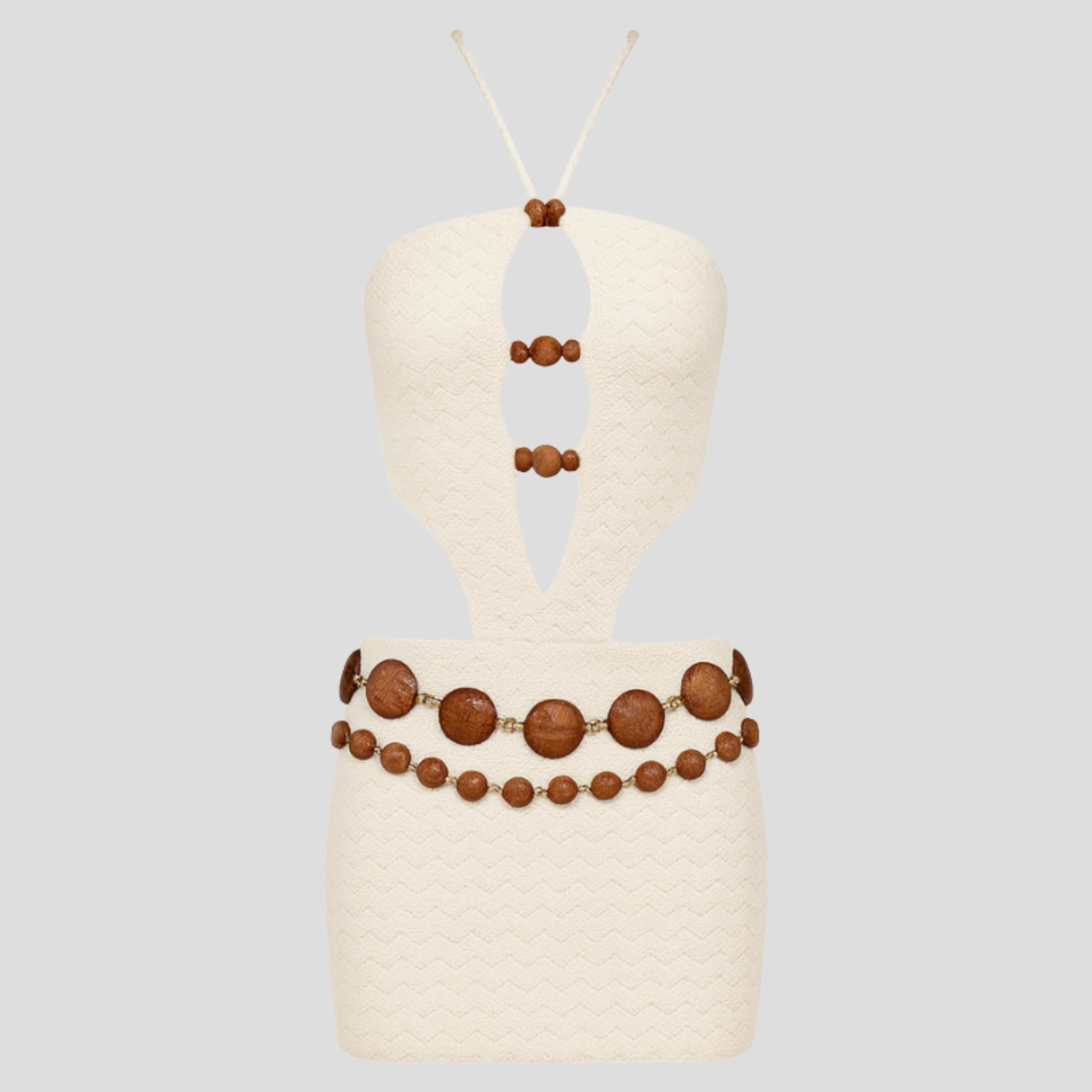 White women's mini dress with cut-out detailing and bead accents