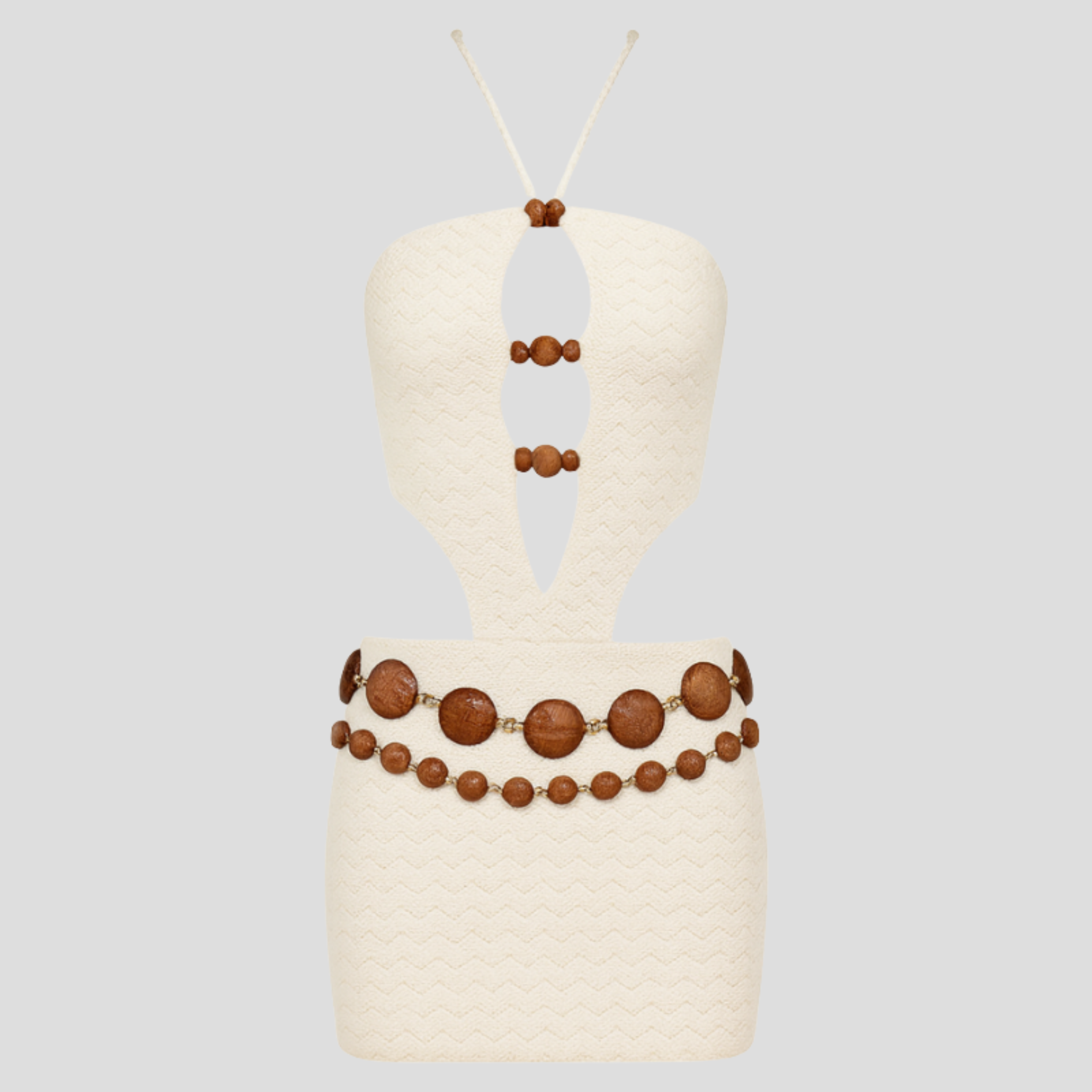 White women's mini dress with cut-out detailing and bead accents