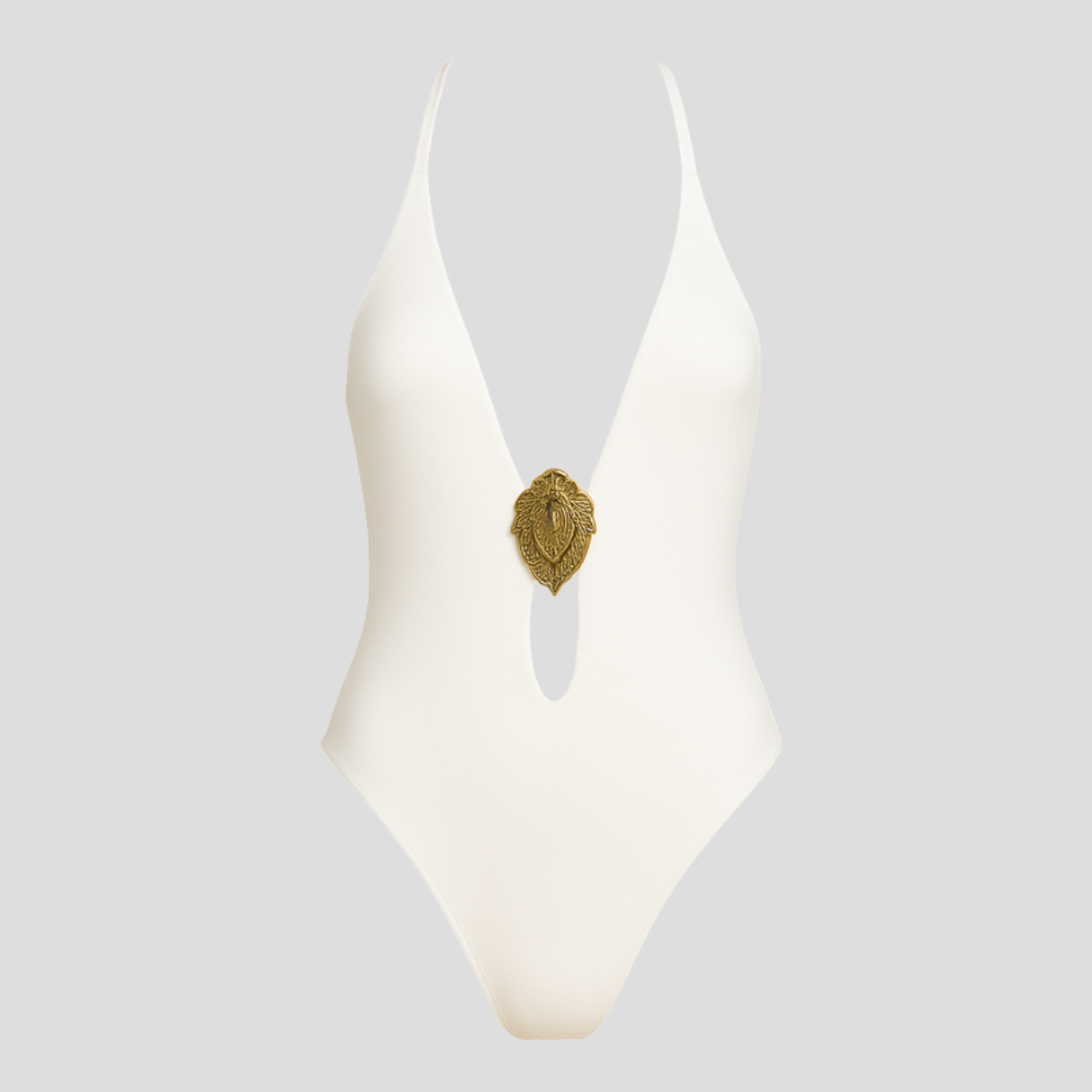 White deep plunge one-piece swimsuit with centered gold medallion detail