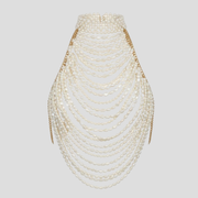 White beaded halter top with cascading bead detail and draped lines for occasion wear