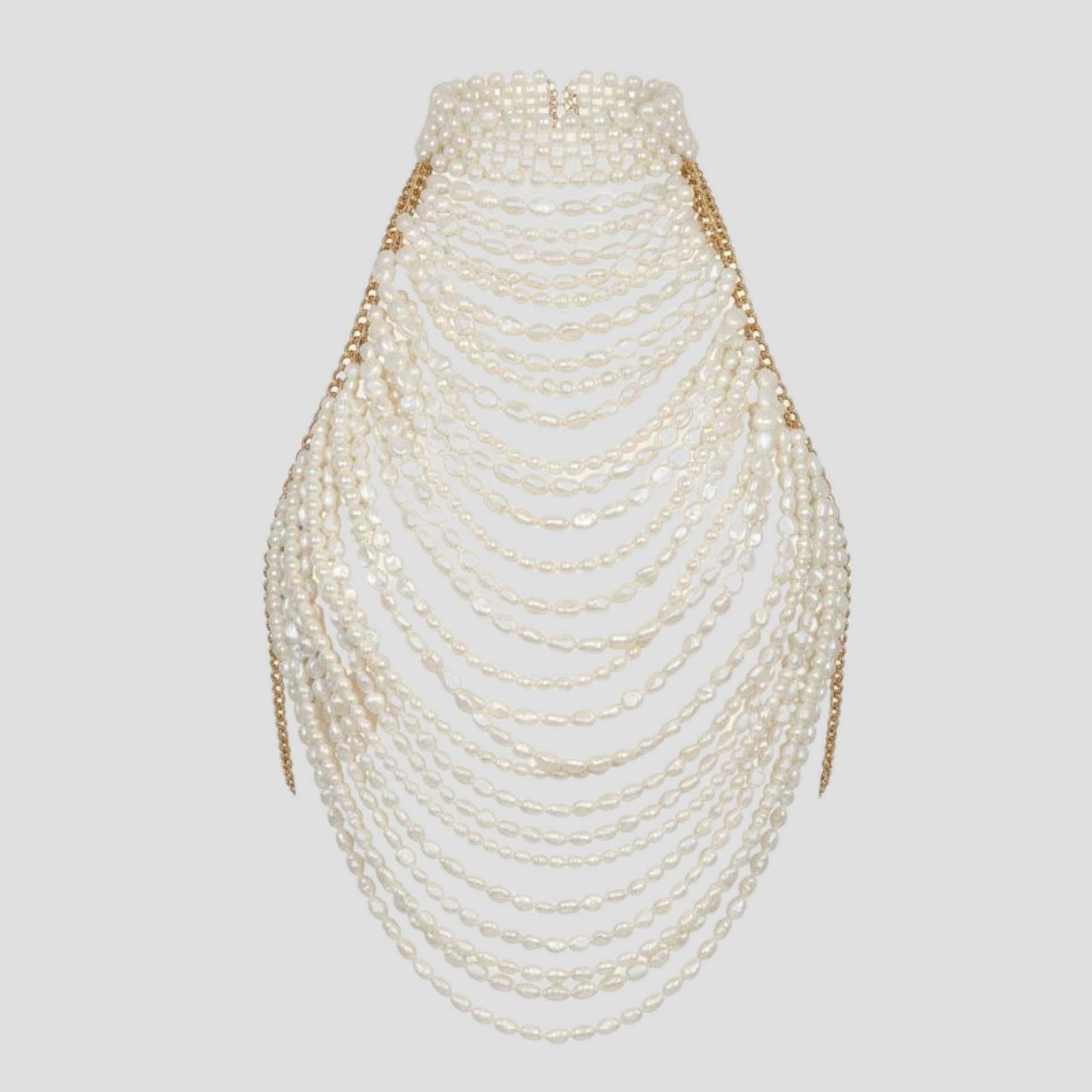 White beaded halter top with cascading bead detail and draped lines for occasion wear