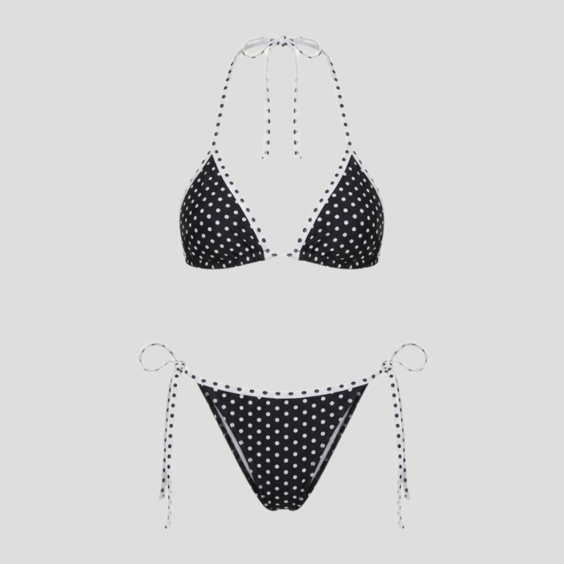 Black polka-dot triangle bikini set with adjustable ties and contrast trim detailing